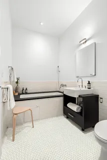 a bathroom with a sink and a toilet