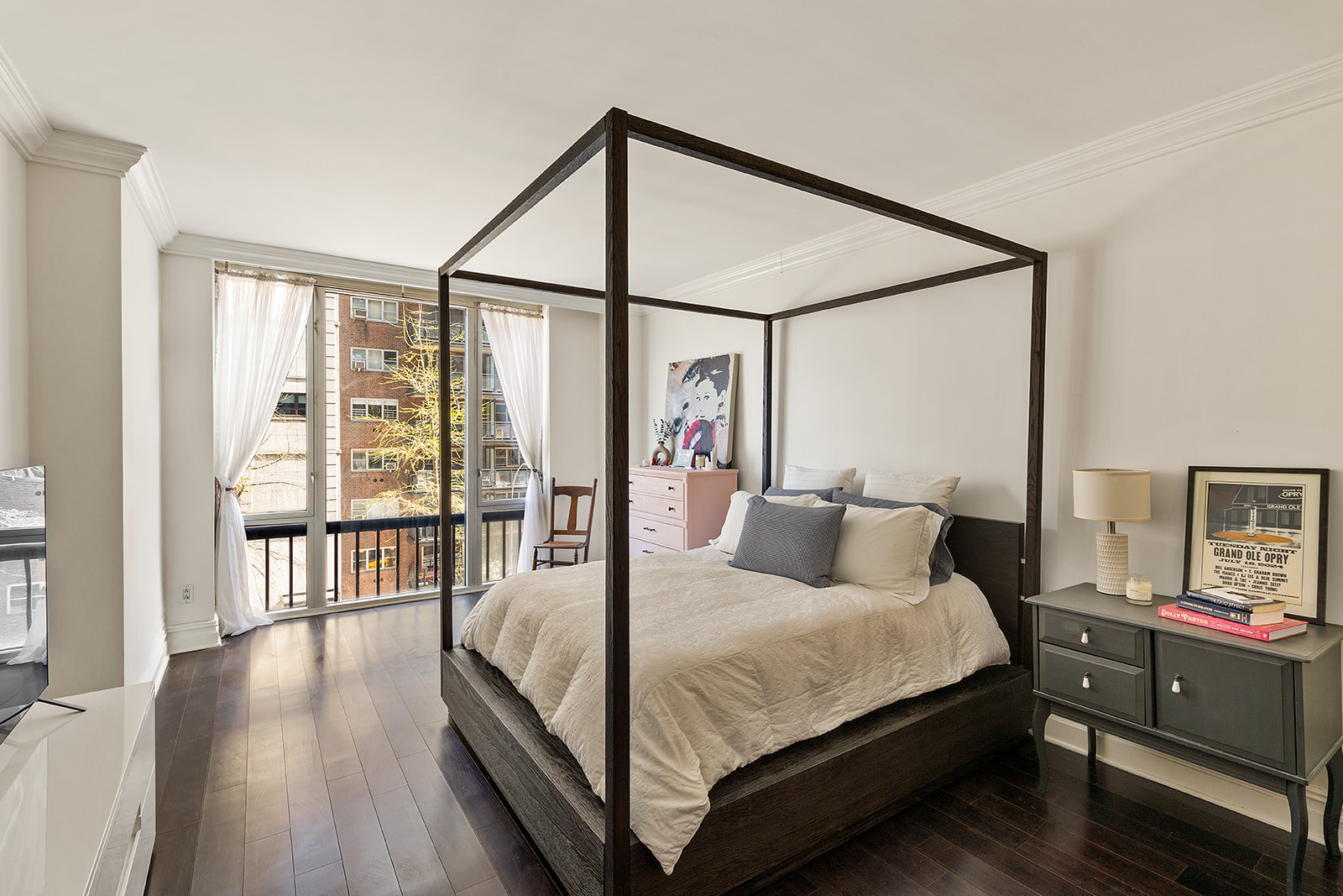 90 East End Avenue, Unit 4B Manhattan, NY 10028 - Photo 4 of 13 a bedroom with a bed and wooden floor