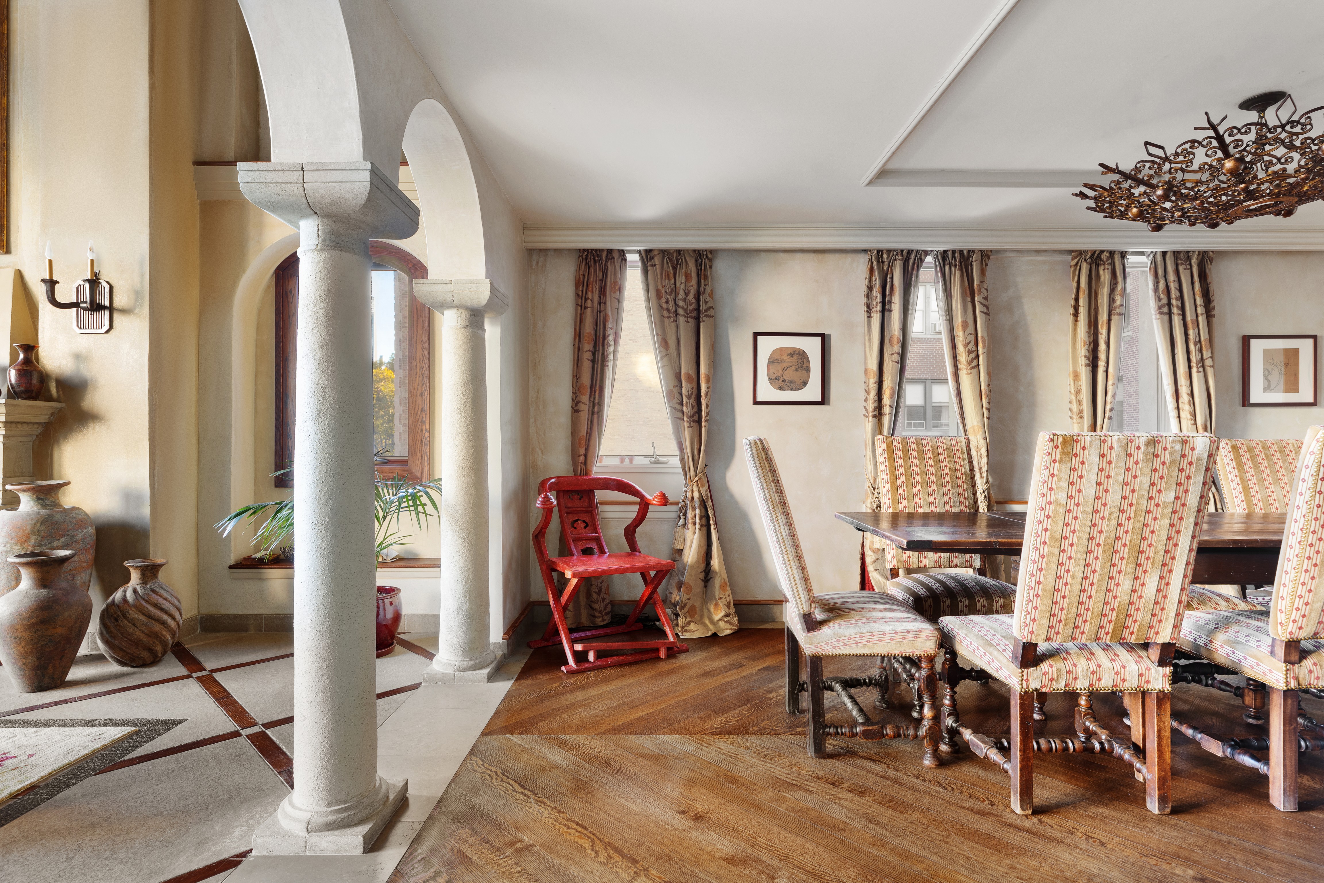 428 Columbus Avenue, Unit PH Manhattan, NY 10024 - Photo 8 of 21 a view of a livingroom with furniture and gym equipment