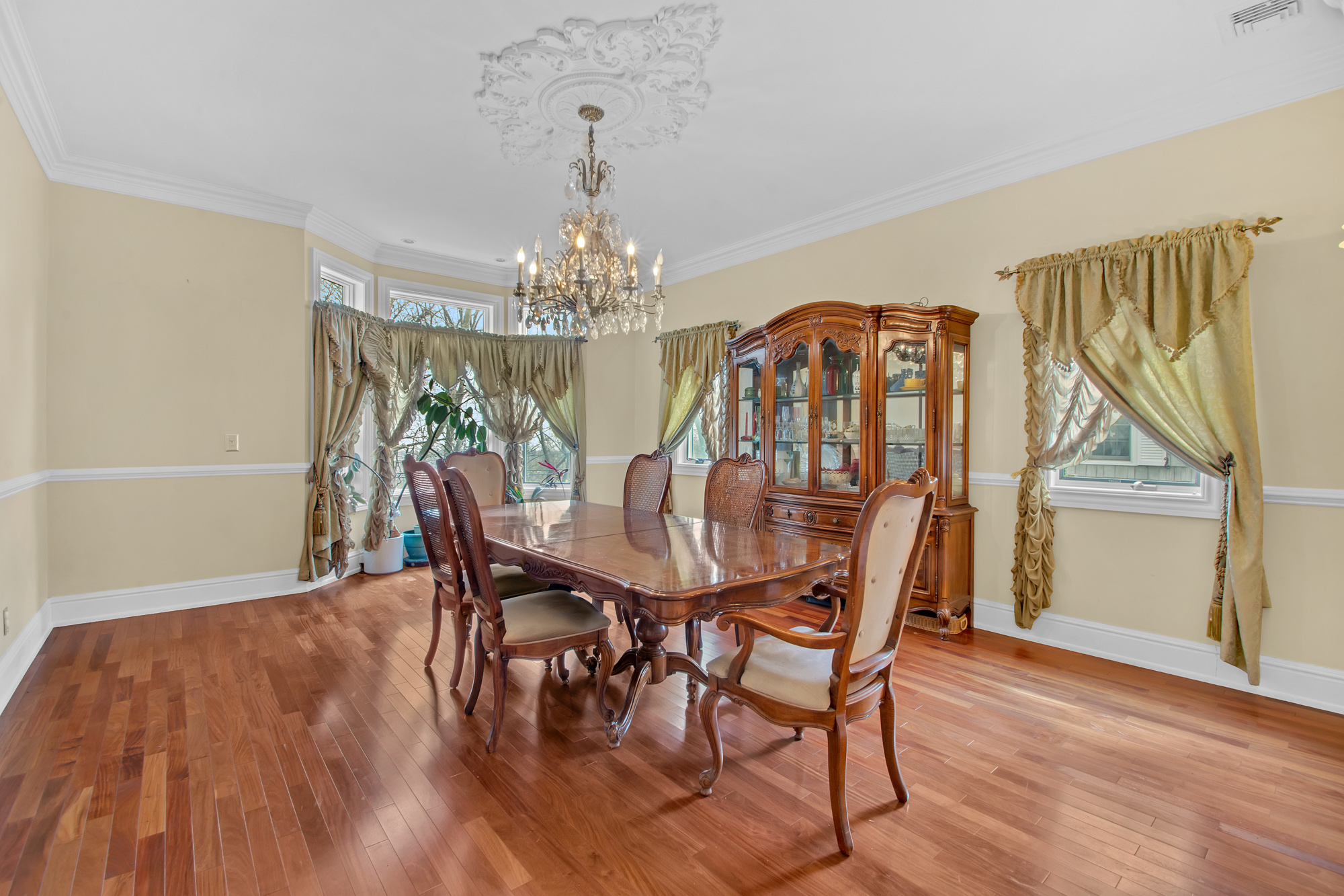 68 Circle Road Staten Island, NY 10304 - Photo 6 of 38 a view of a dining room with furniture window and wooden floor