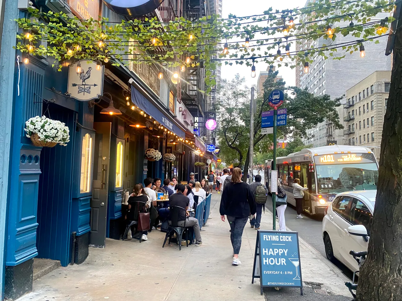 a view of path along with retail shop and outdoor seating
