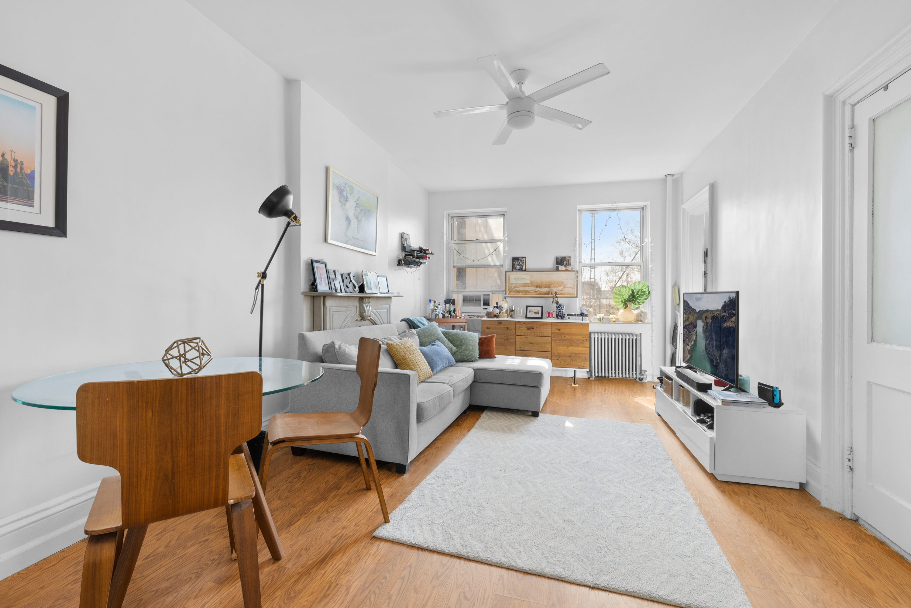 96 2nd Place Brooklyn, NY 11231 - Photo 6 of 14 a living room with furniture and a flat screen tv