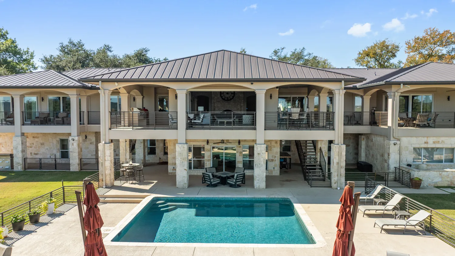 a kitchen with stainless steel appliances granite countertop a sink and a counter