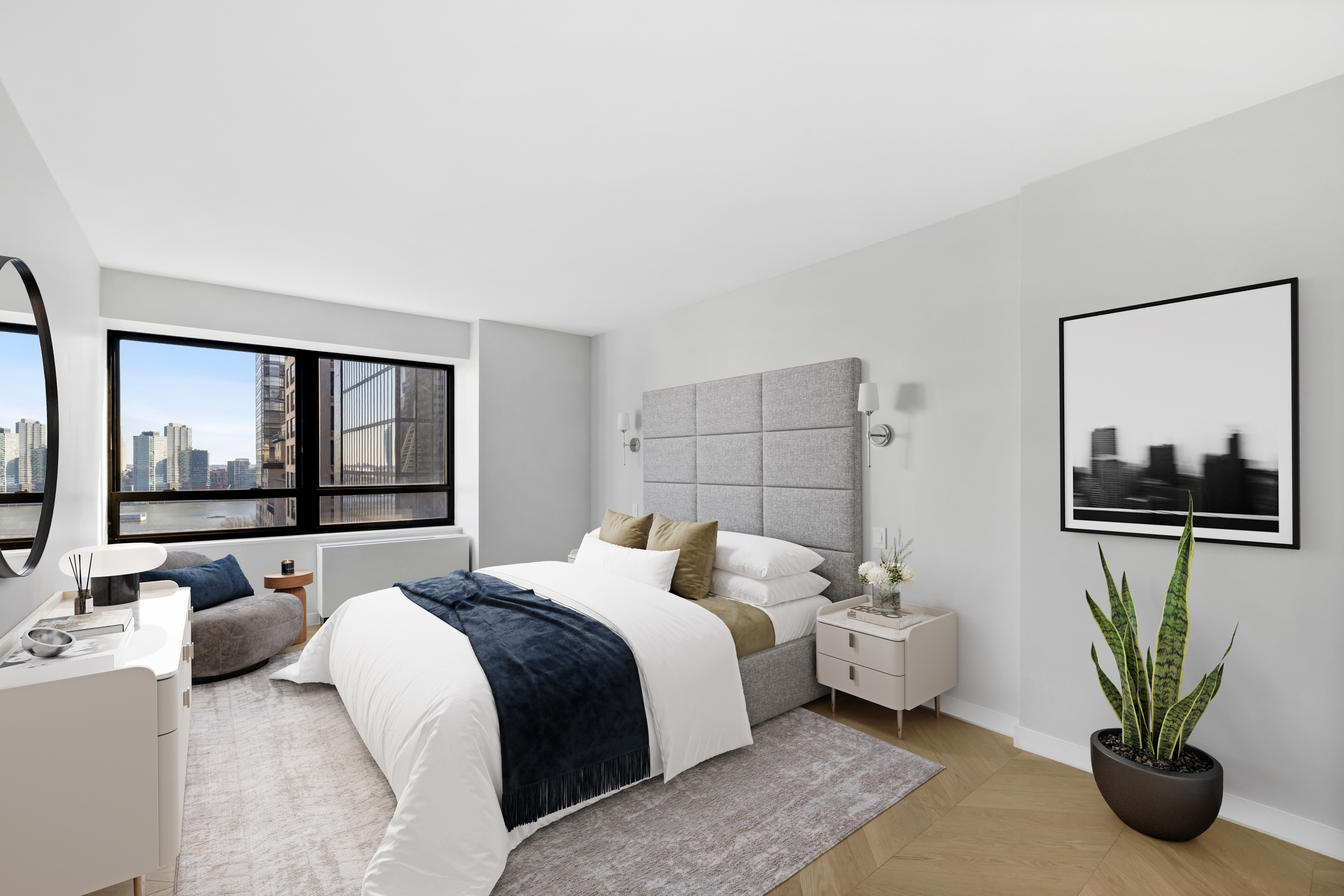 240 East 47th Street, Unit 16CD Manhattan, NY 10017 - Photo 6 of 14 a bedroom with bed and large window