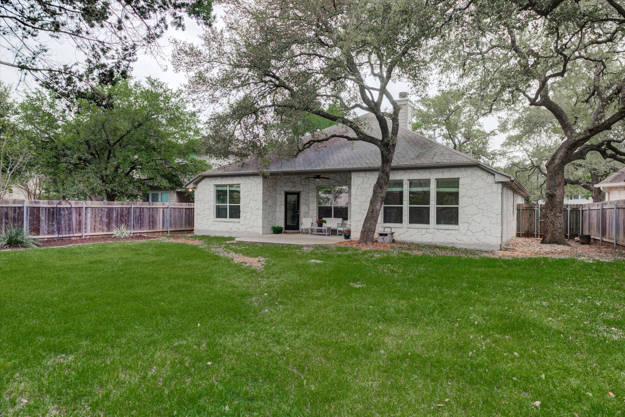 5412 Batak Lane Austin, TX 78749 - Photo 33 of 40 a view of a house with a backyard
