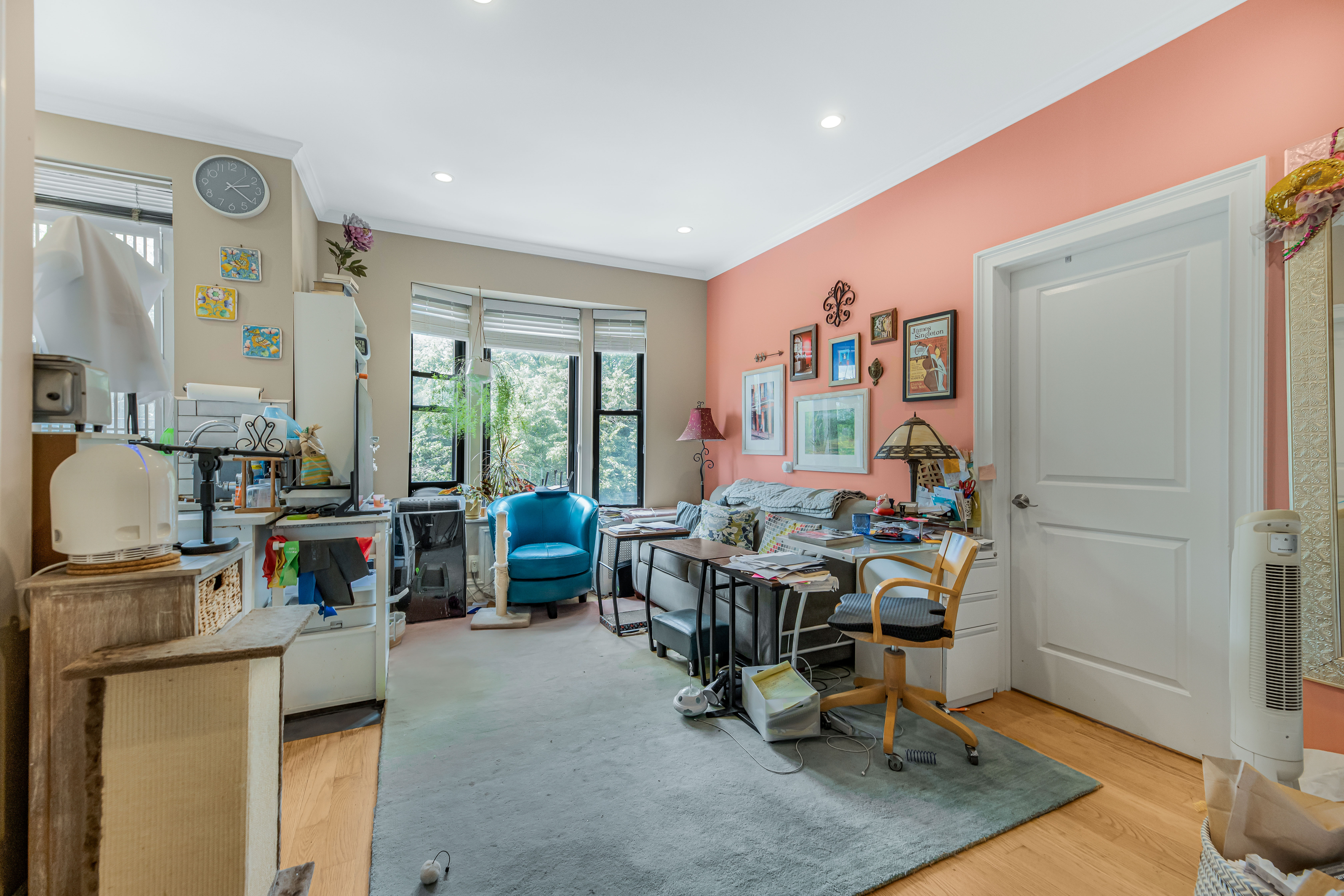 660 Riverside Drive, Unit 4J Manhattan, NY 10031 - Photo 2 of 7 a workspace with furniture window and outside view