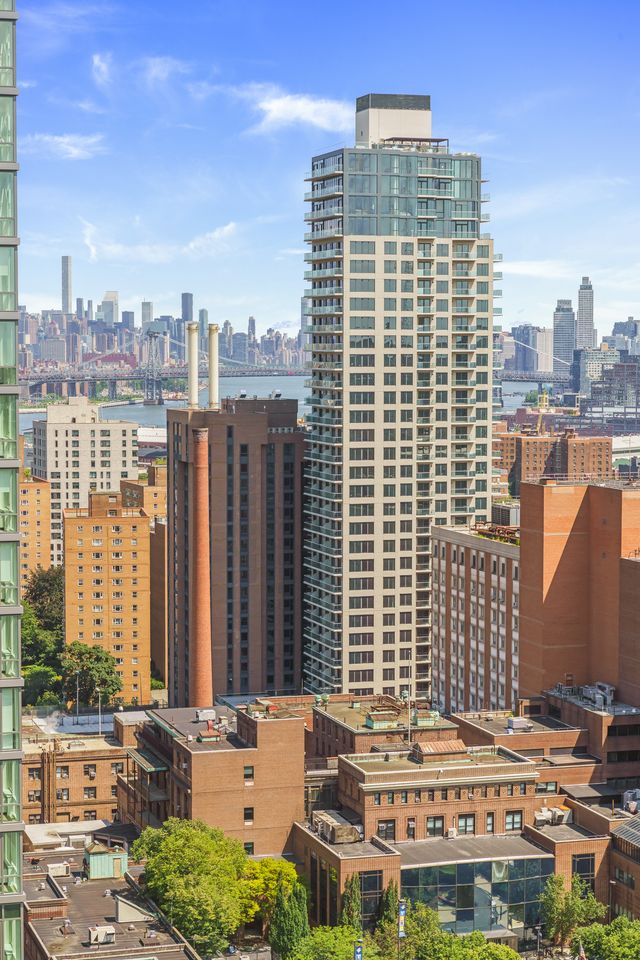 230 Ashland Place, Unit 26A Brooklyn, NY 11217 - Photo 2 of 12 a view of a city with tall buildings