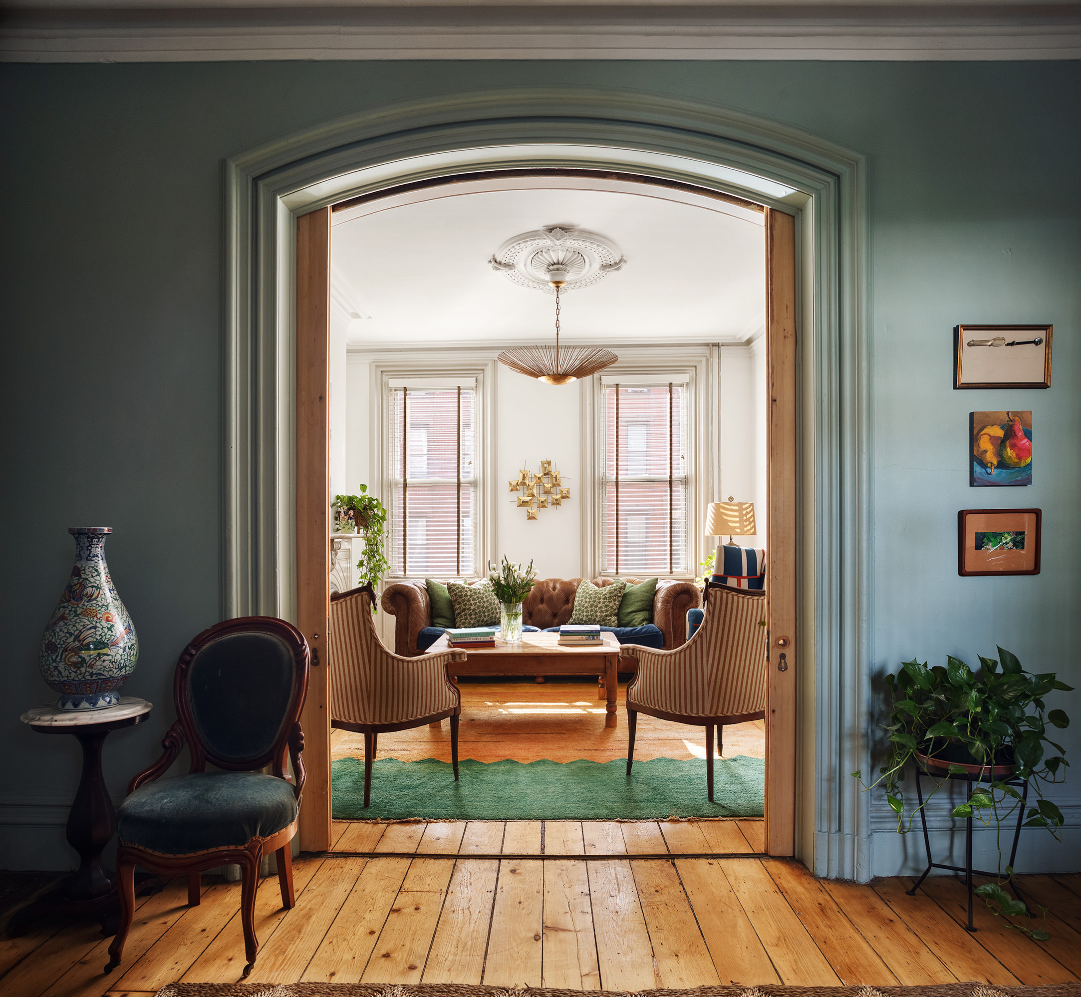 141 Calyer Street Brooklyn, NY 11222 - Photo 2 of 25 a living room with furniture and a large window