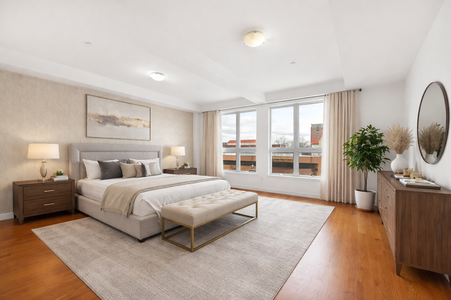 3112 Emmons Avenue, Unit 206 Brooklyn, NY 11235 - Photo 4 of 10 a spacious bedroom with a large bed and a large window