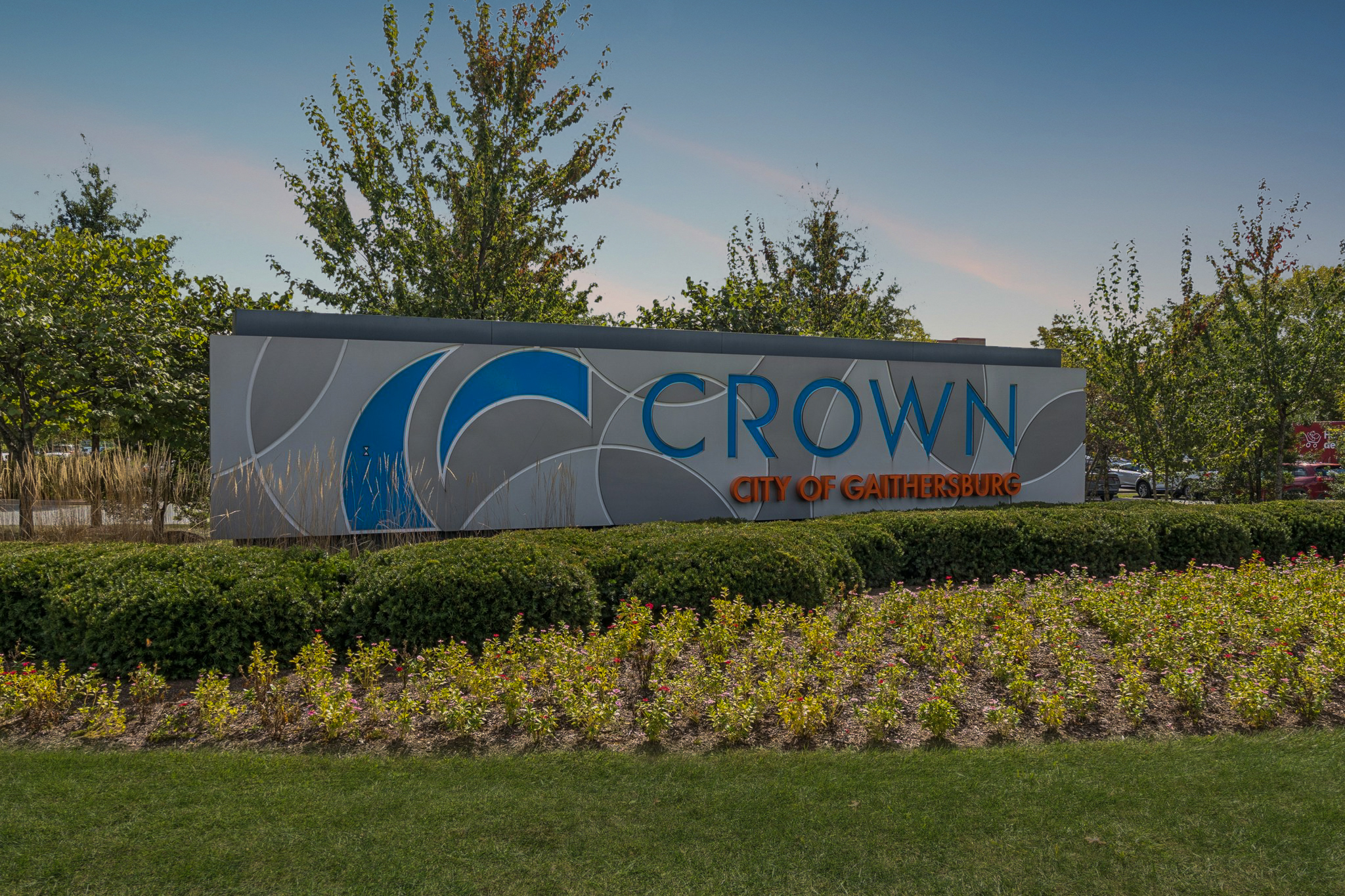 502 Diamondback Drive, Unit 310 Gaithersburg, MD 20878 - Photo 2 of 7 a street sign that is sitting in front of flowers