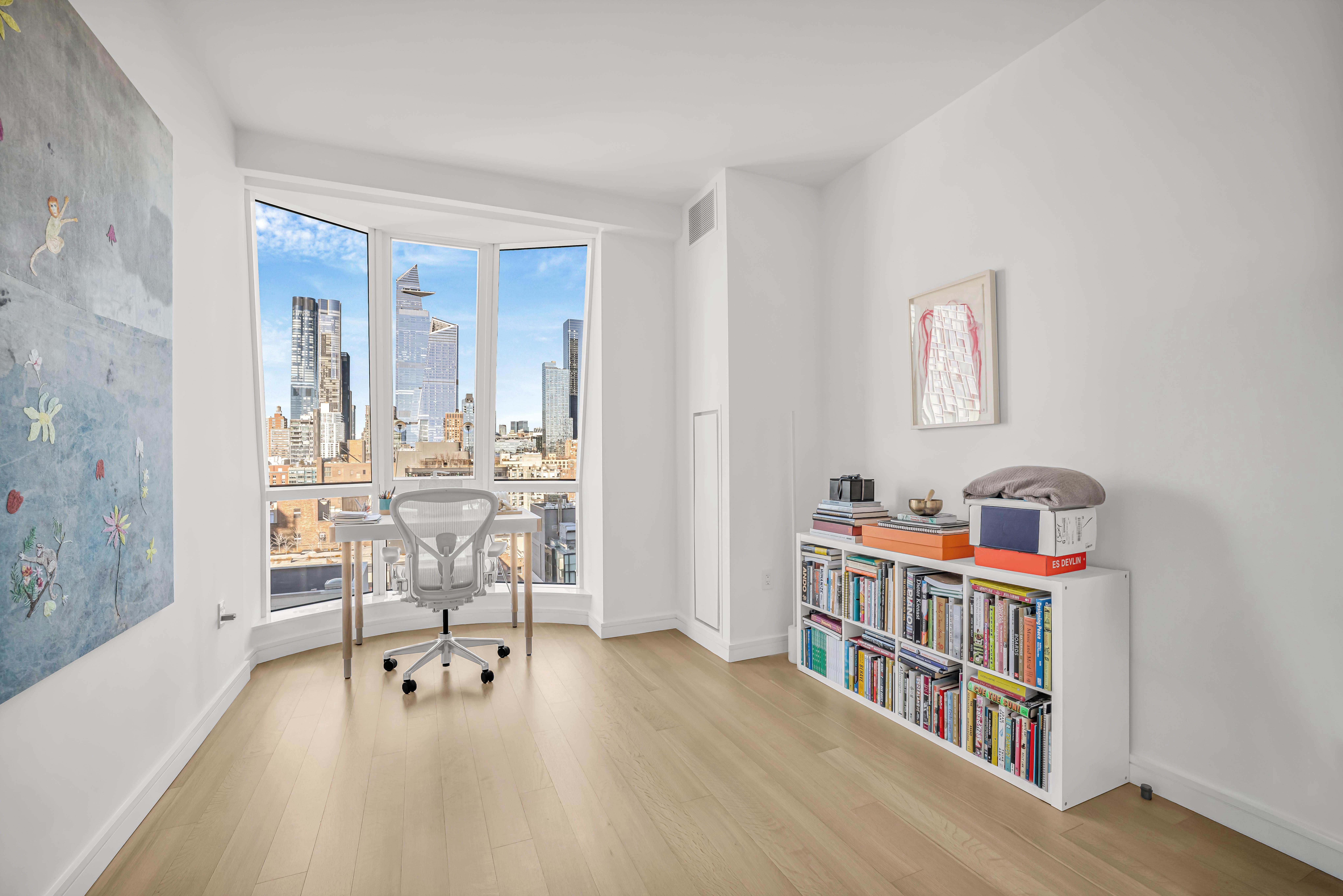 515 West 18th Street, Unit 1504 Manhattan, NY 10011 - Photo 10 of 11 a reading room with furniture and book shelf