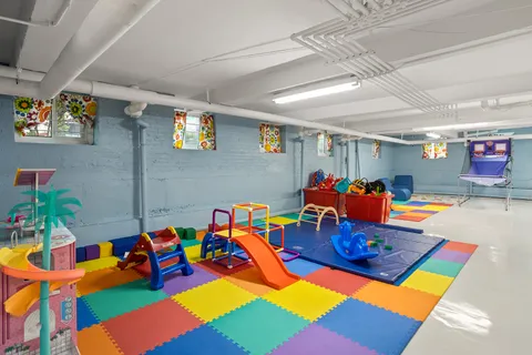 a play room with furniture