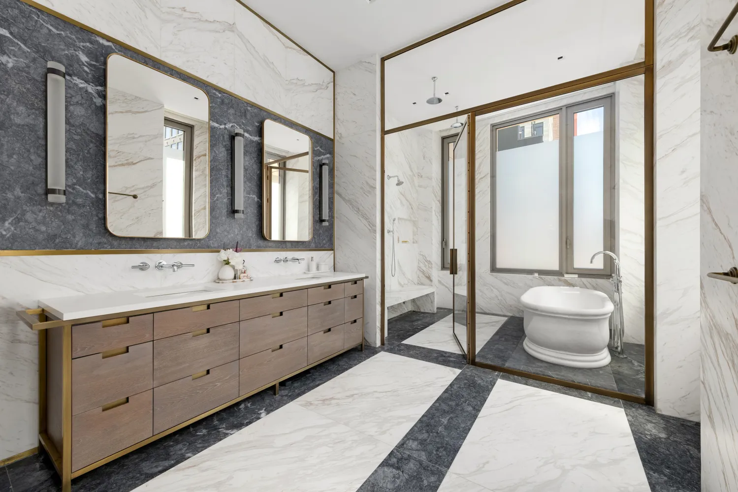 a spacious bathroom with a double vanity sink toilet mirror and windows