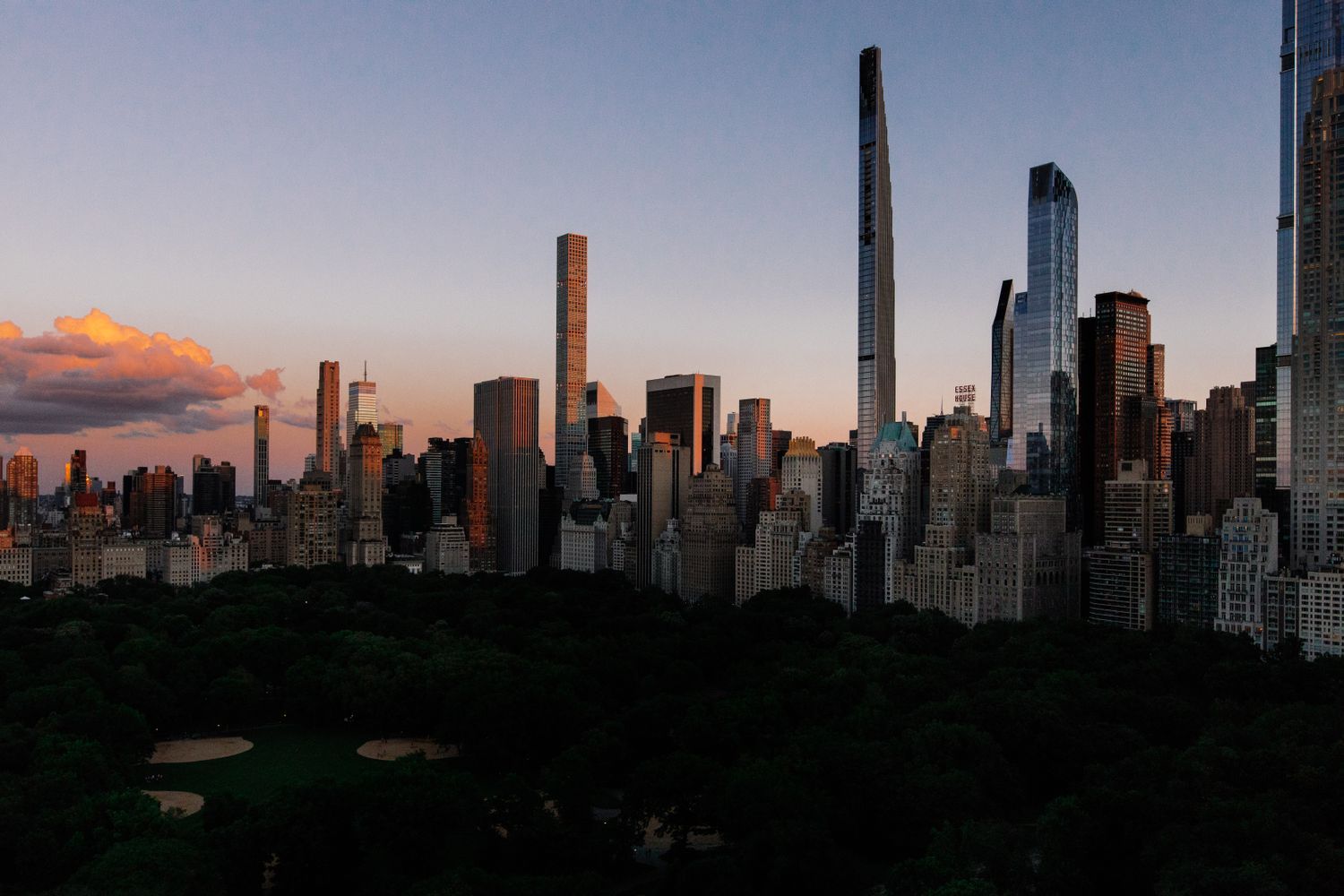 a view of a city with tall buildings