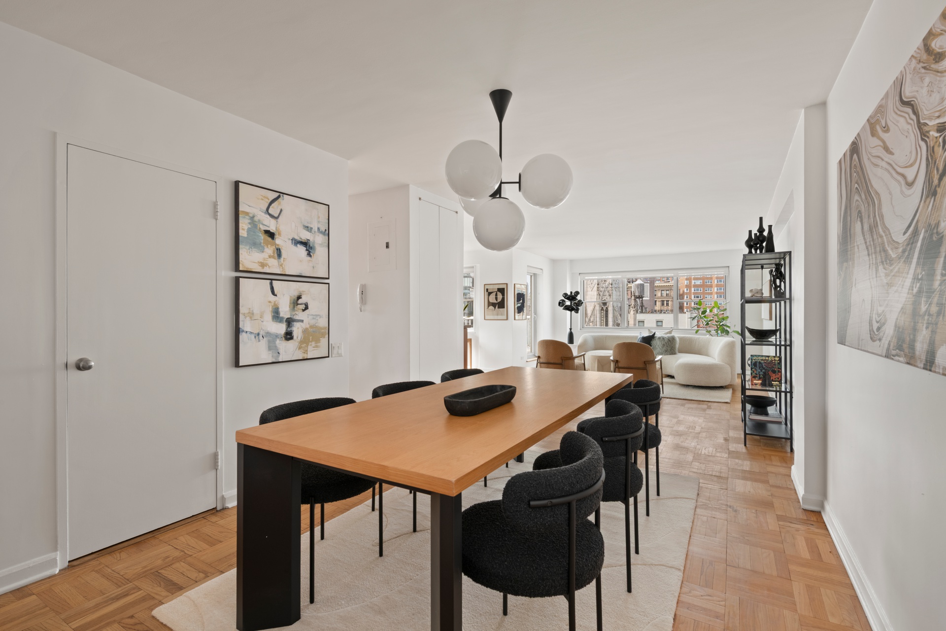 70 East 10th Street, Unit 15R Manhattan, NY 10003 - Photo 2 of 12 a view of a dining room with furniture