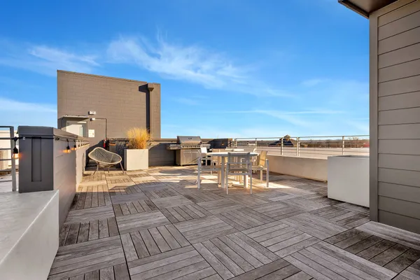 a view of a terrace with chairs