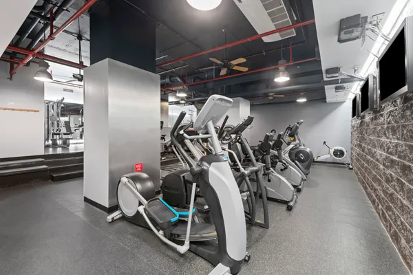 a view of a room with gym equipment