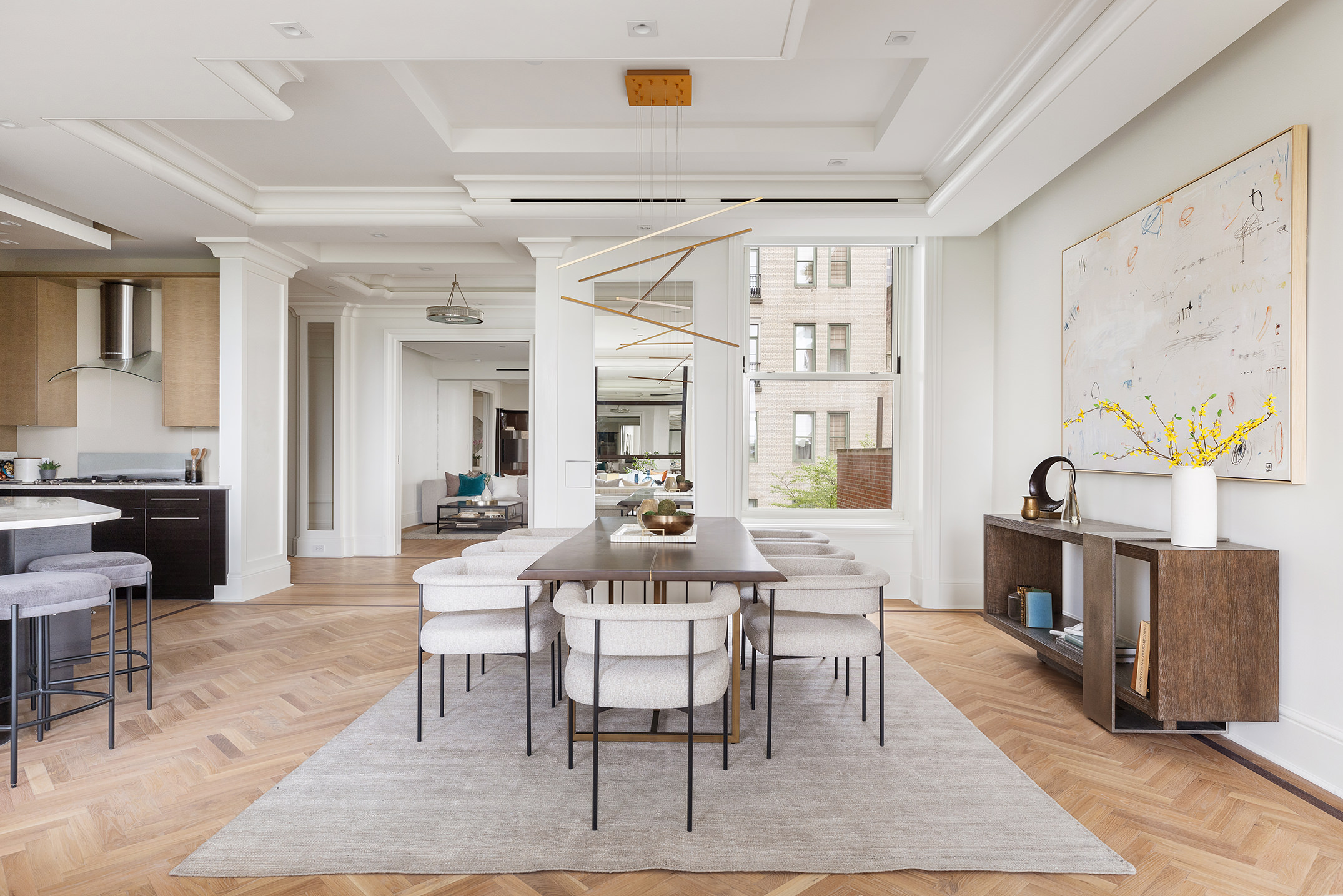 1 Central Park South, Unit 8010203 Manhattan, NY 10019 - Photo 11 of 45 a view of a dining room with furniture a rug and wooden floor