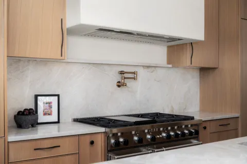 a bathroom with a sink a vanity and a mirror
