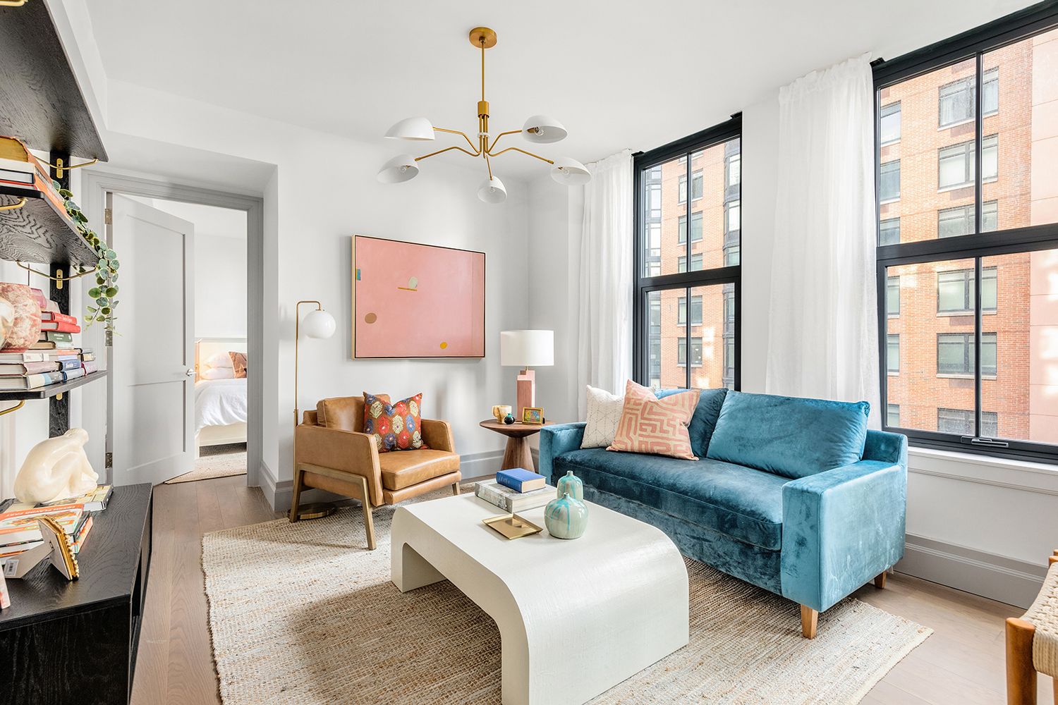 76 Schermerhorn Street, Unit 8E Brooklyn, NY 11201 - Photo 1 of 8 a living room with furniture and a large window