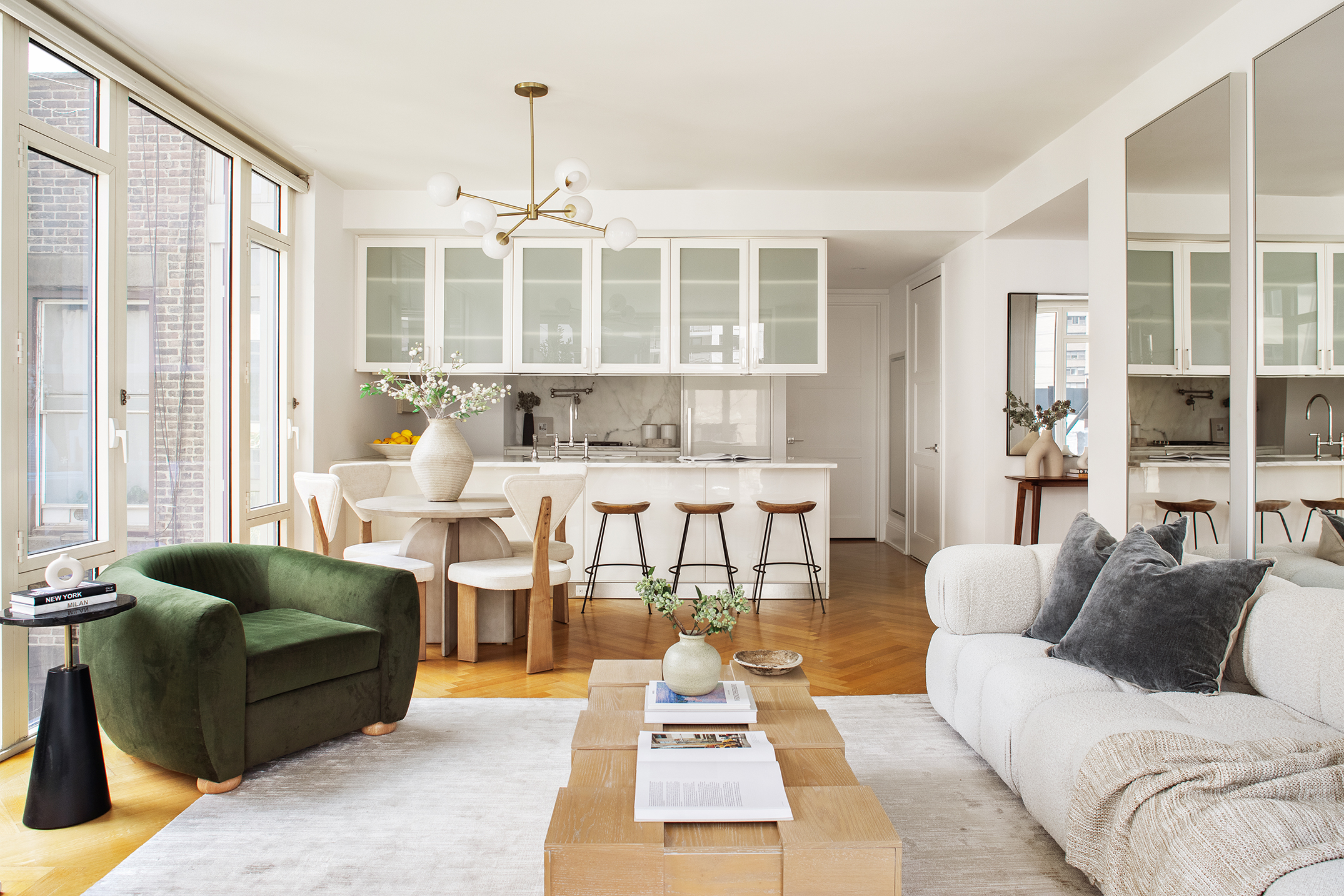 305 East 85th Street, Unit 5B Manhattan, NY 10028 - Photo 4 of 11 a living room with furniture and a large window