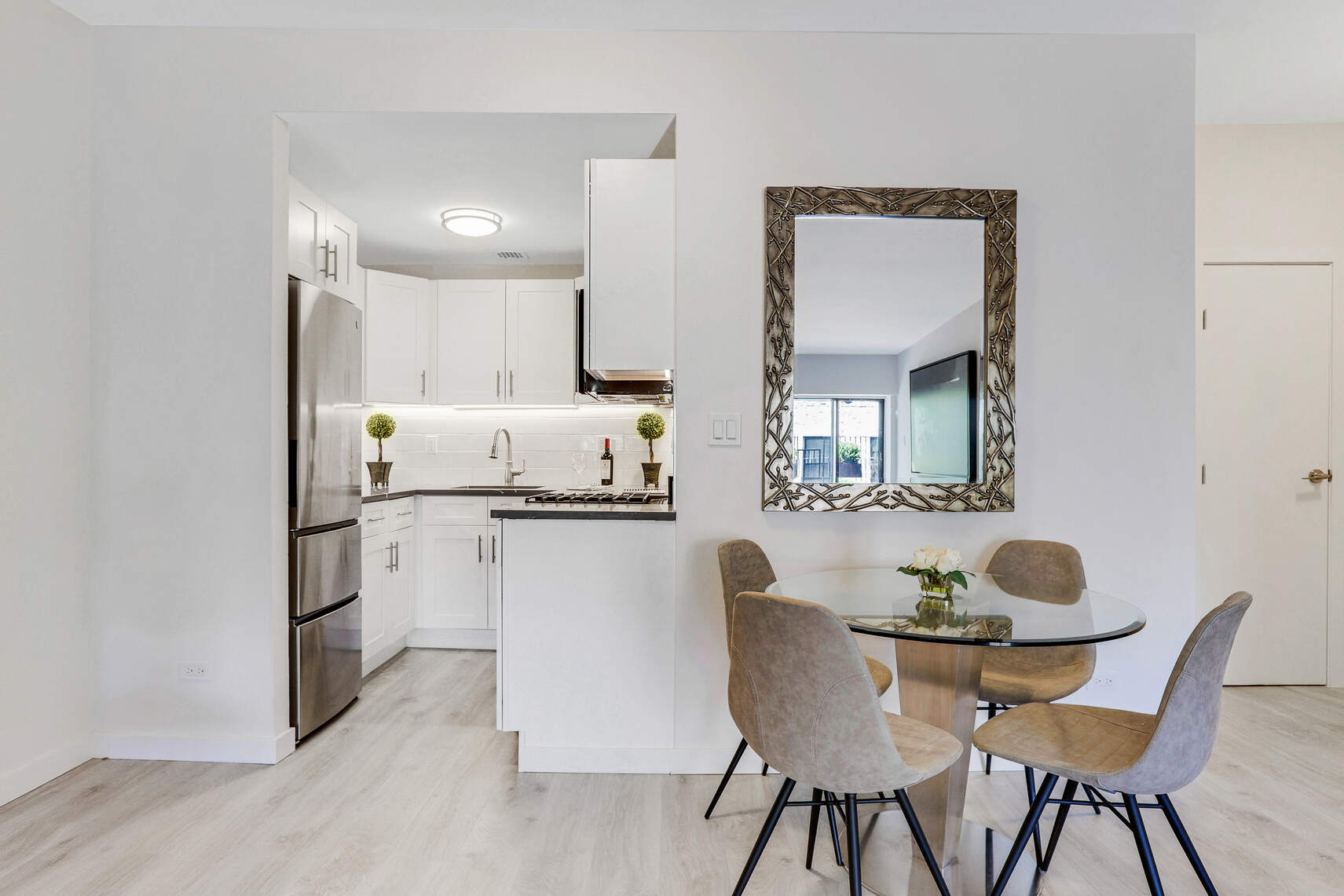 237 East 17th Street, Unit 520 Manhattan, NY 10003 - Photo 6 of 14 a dining room with furniture and window