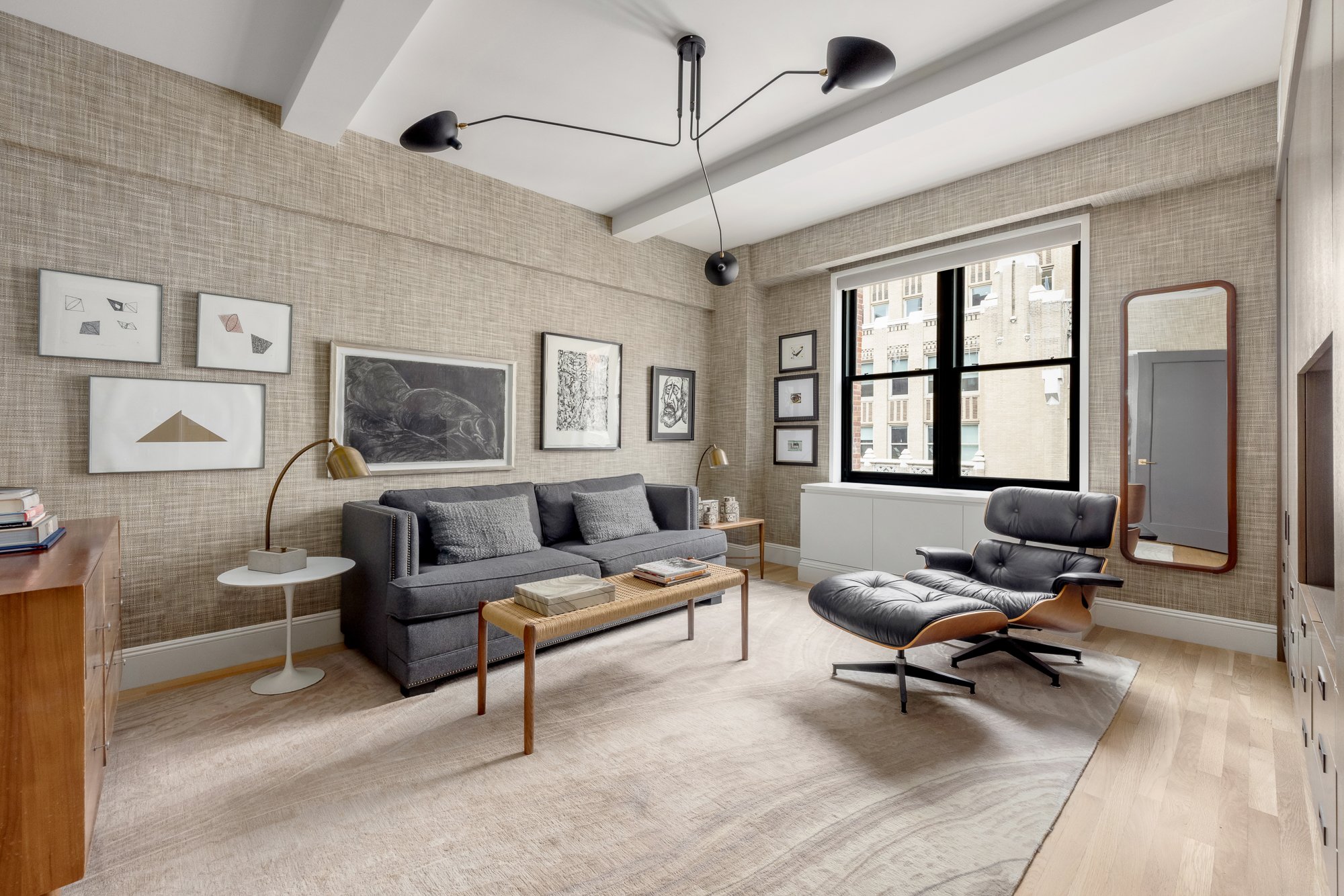 220 Madison Avenue, Unit 14/15O Manhattan, NY 10016 - Photo 11 of 18 a living room with furniture rug and window
