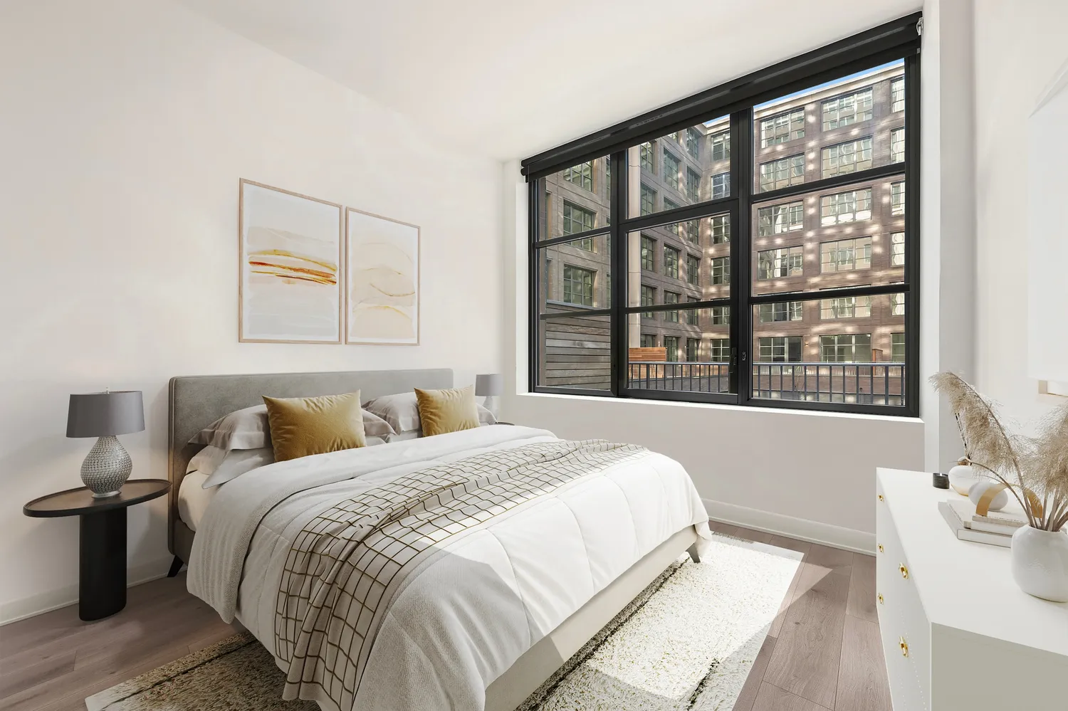 a bedroom with a large bed and a large window