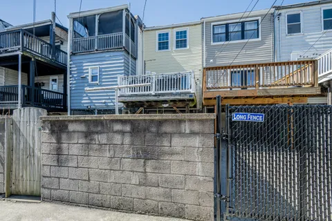 a front view of a house with a porch