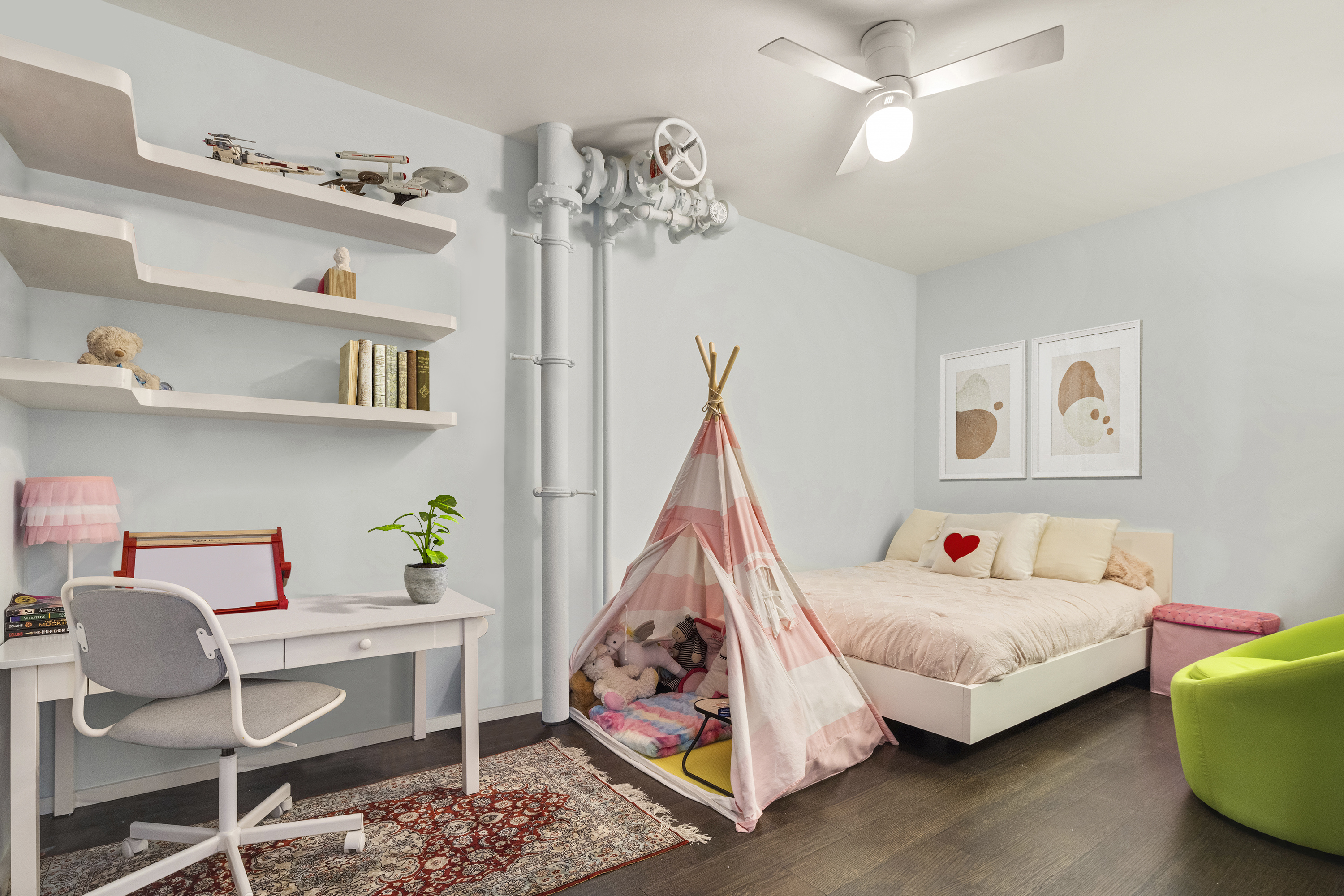 101 Wooster Street, Unit 3/4F Manhattan, NY 10012 - Photo 9 of 16 a bed room with furniture and a window