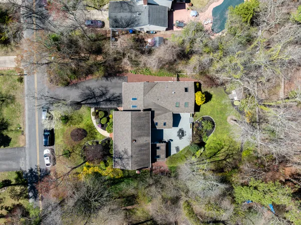 a picture of a bench in front of a window