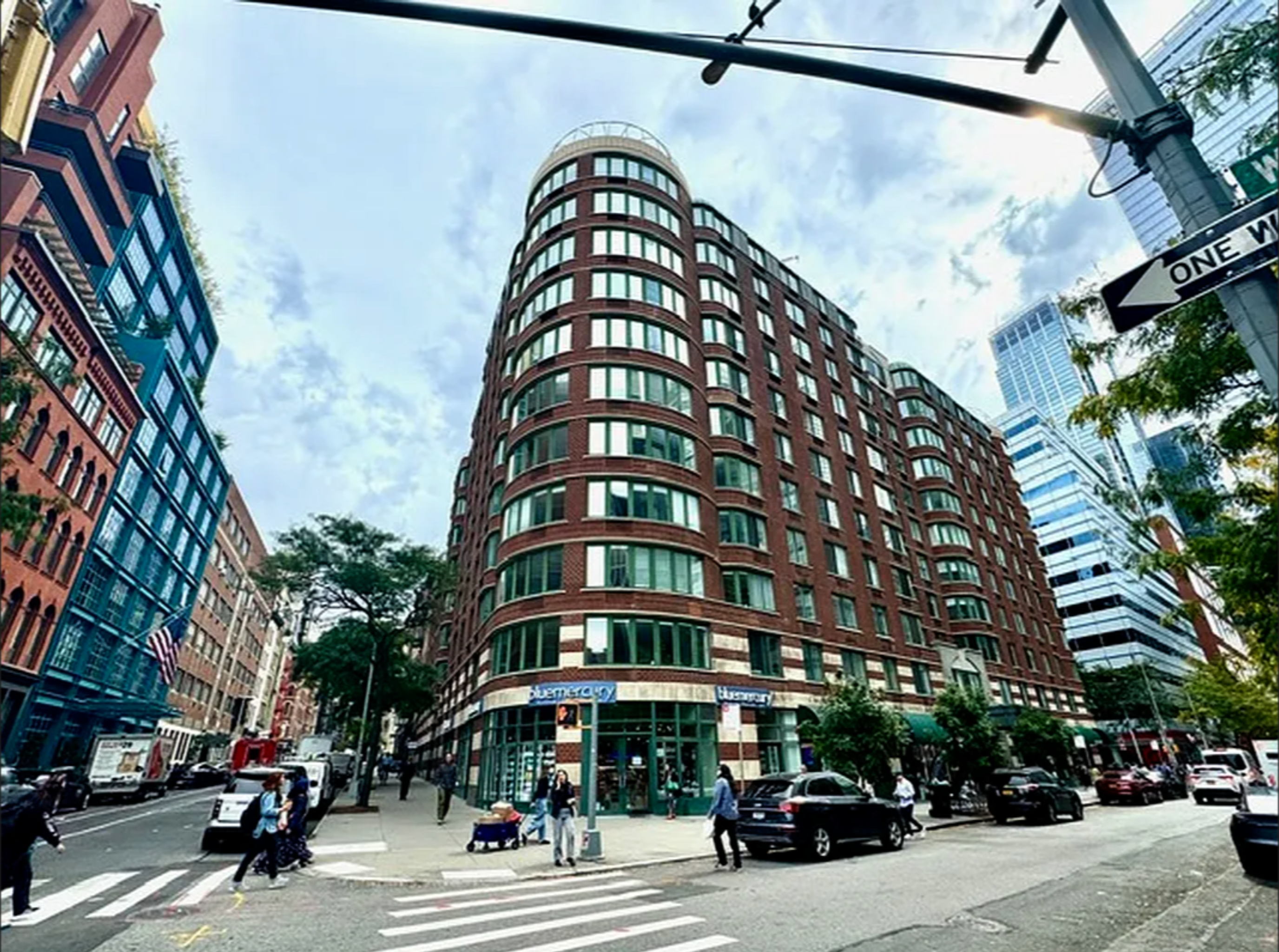 275 Greenwich Street, Unit 11G Manhattan, NY 10007 - Photo 17 of 18 a picture of street with view of building