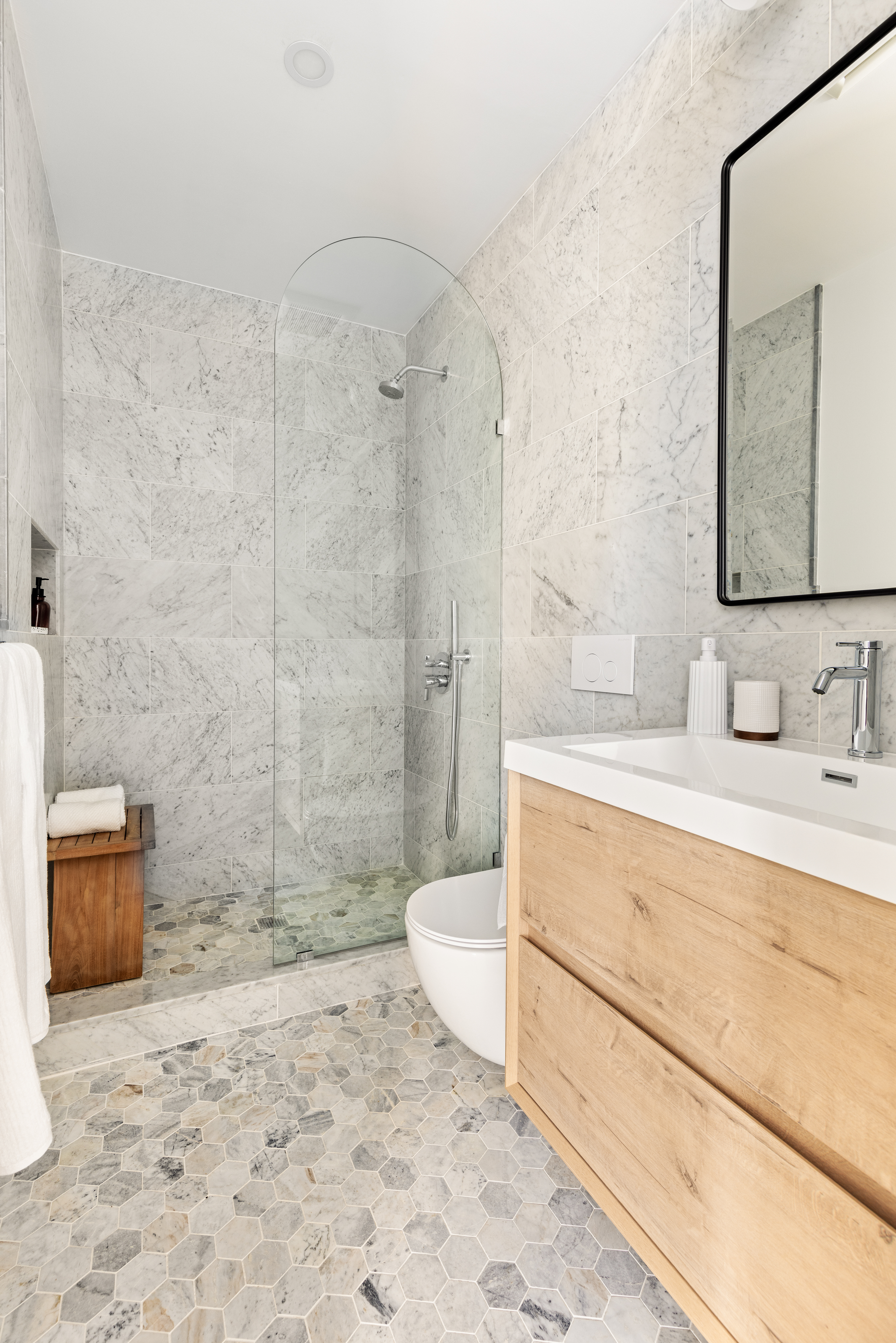 744 Park Place, Unit 2A Brooklyn, NY 11216 - Photo 5 of 11 a bathroom with a sink toilet and shower