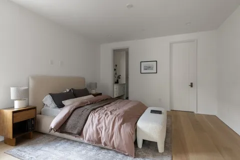 a bathroom with a tub and a shower
