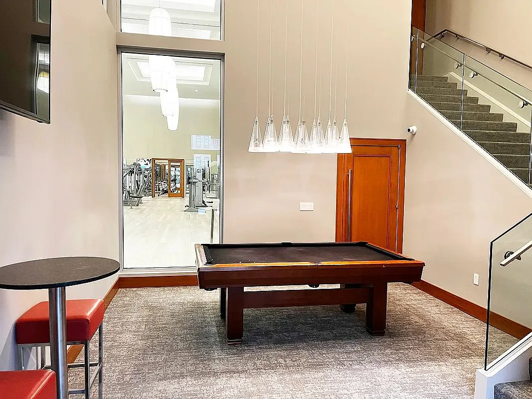 20 West Street, Unit 28F Manhattan, NY 10004 - Photo 14 of 18 a room with furniture and window