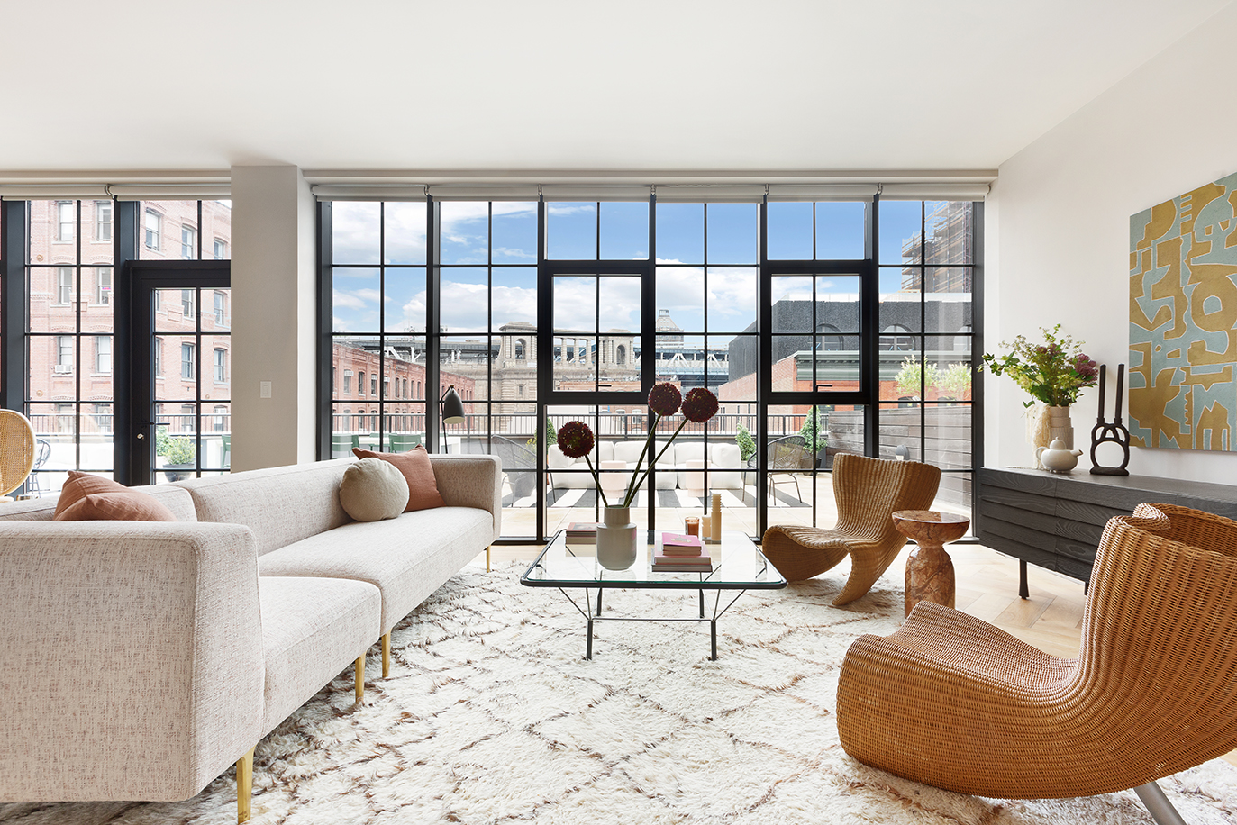 51 Jay Street, Unit PHE Brooklyn, NY 11201 - Photo 2 of 23 a living room with furniture and a floor to ceiling window