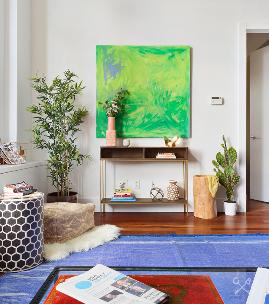 60 Broadway, Unit 10M Brooklyn, NY 11249 - Photo 5 of 12 a living room filled with furniture and a potted plant