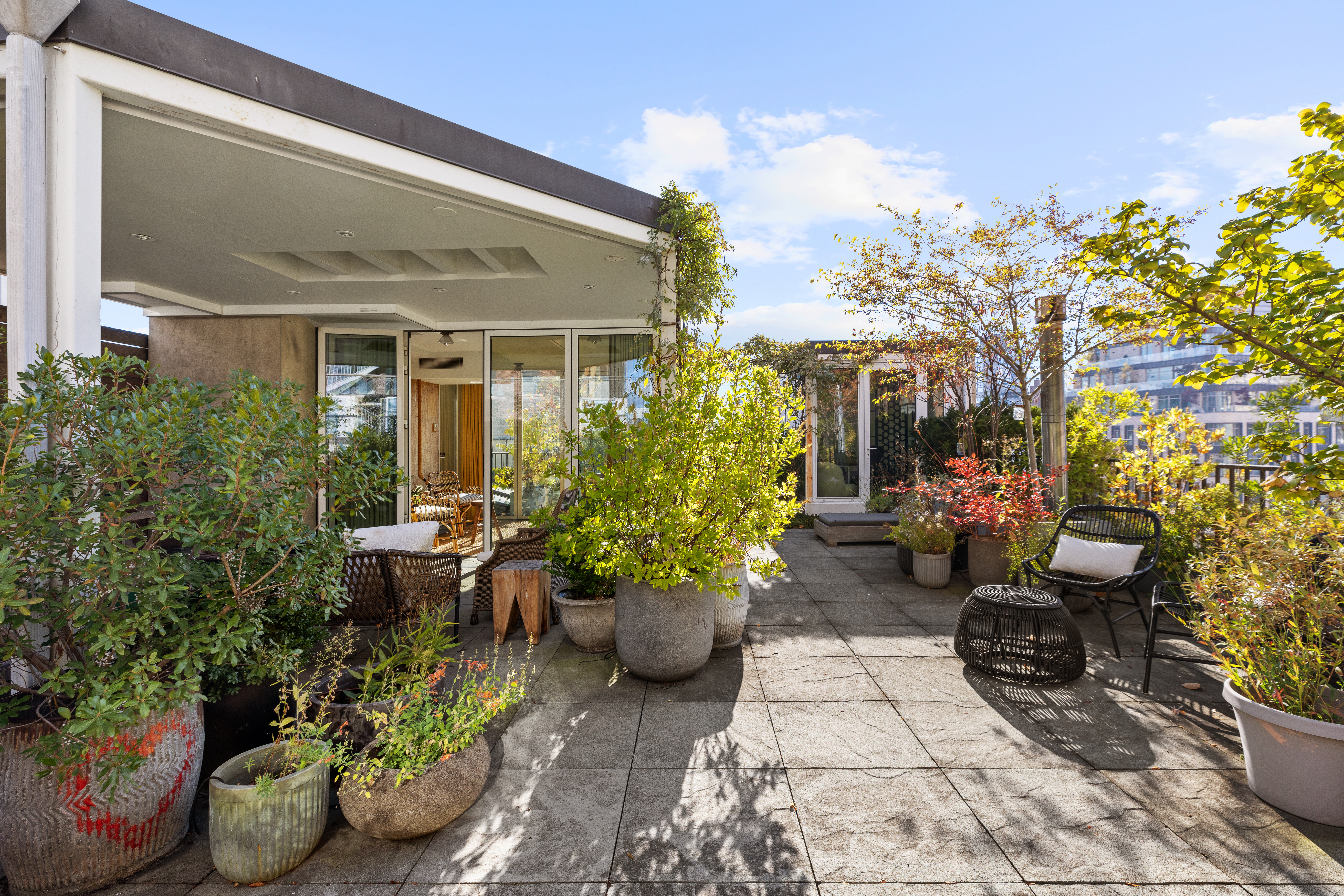 7 Bond Street, Unit PHAB Manhattan, NY 10012 - Photo 2 of 20 a view of a backyard with sitting area
