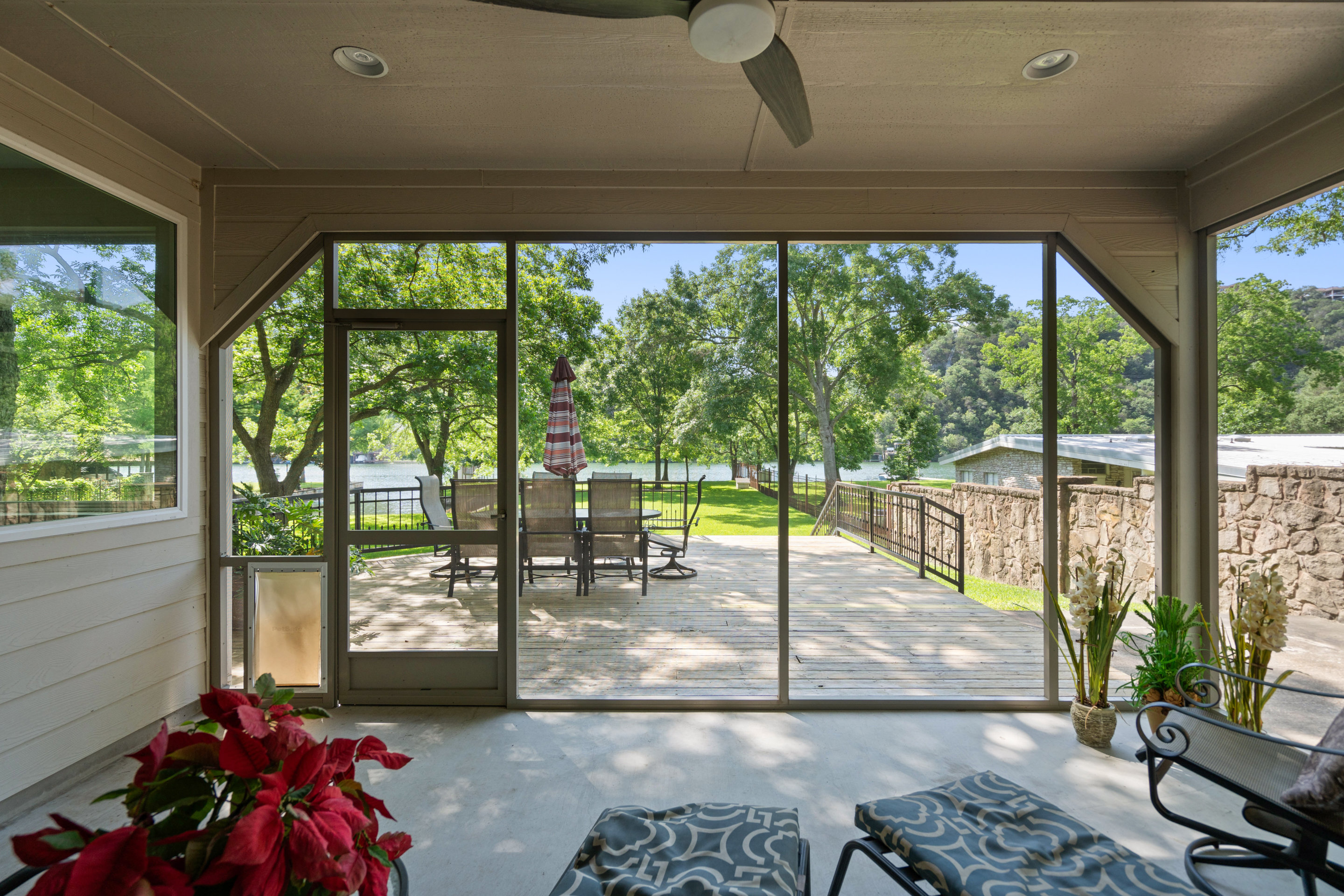 2603 Pearce Road Austin, TX 78730 - Photo 35 of 41 a living room filled with furniture and a floor to ceiling window
