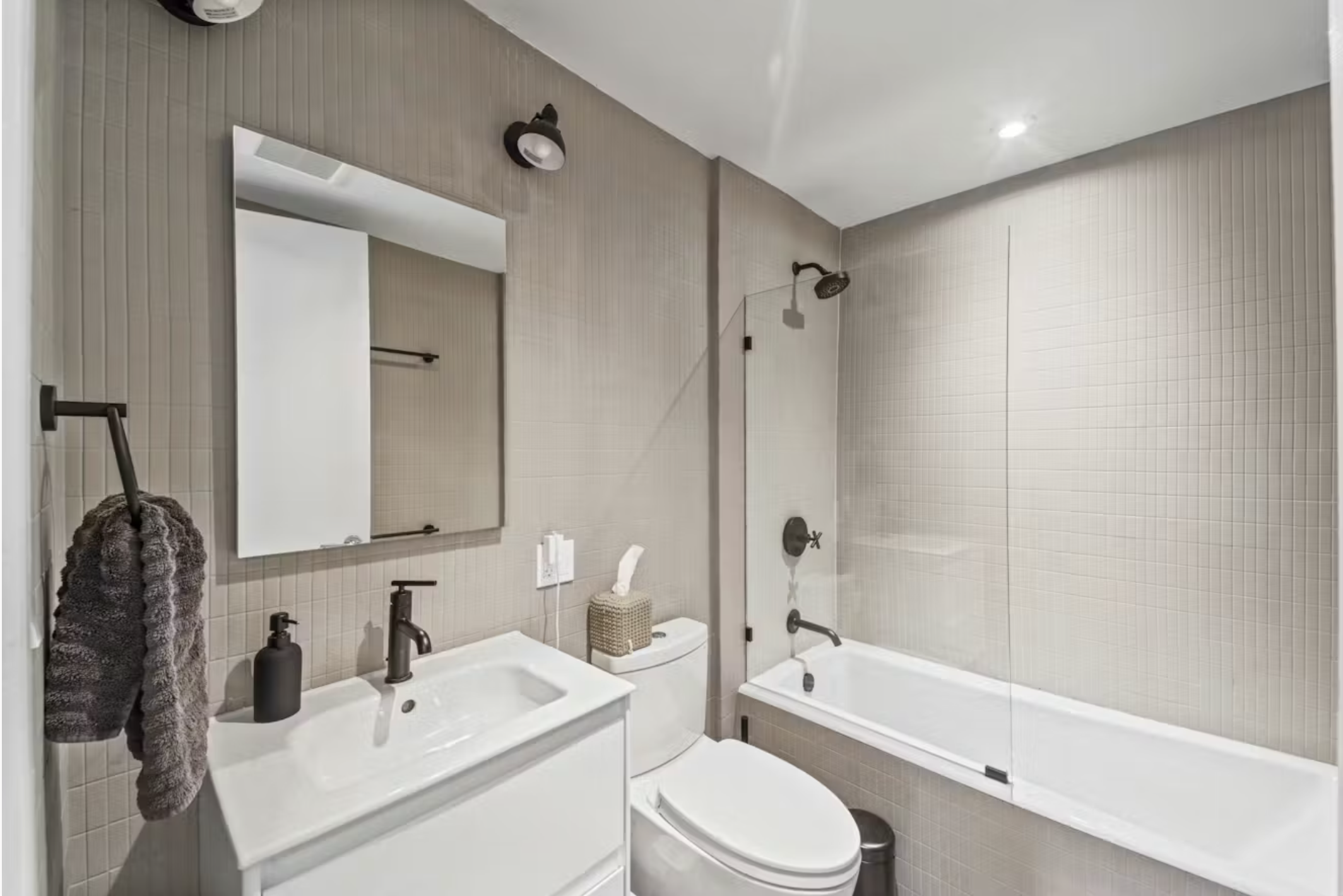 304 Warren Street, Unit 1 Brooklyn, NY 11201 - Photo 8 of 16 a bathroom with a sink toilet and shower