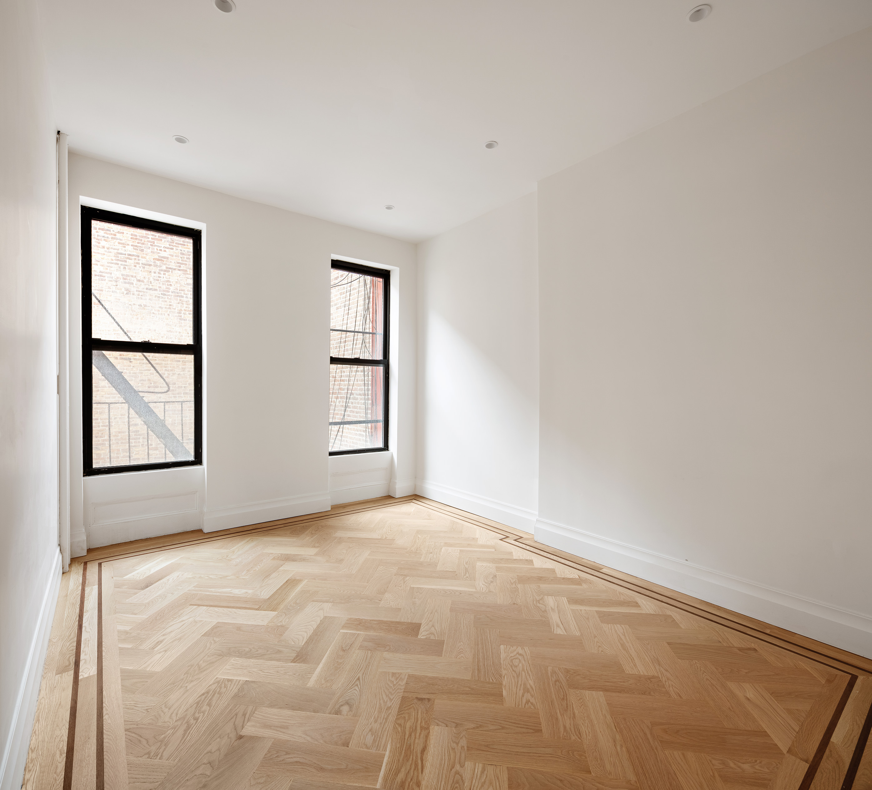 80 7th Avenue, Unit 2 Brooklyn, NY 11217 - Photo 3 of 8 an empty room with windows