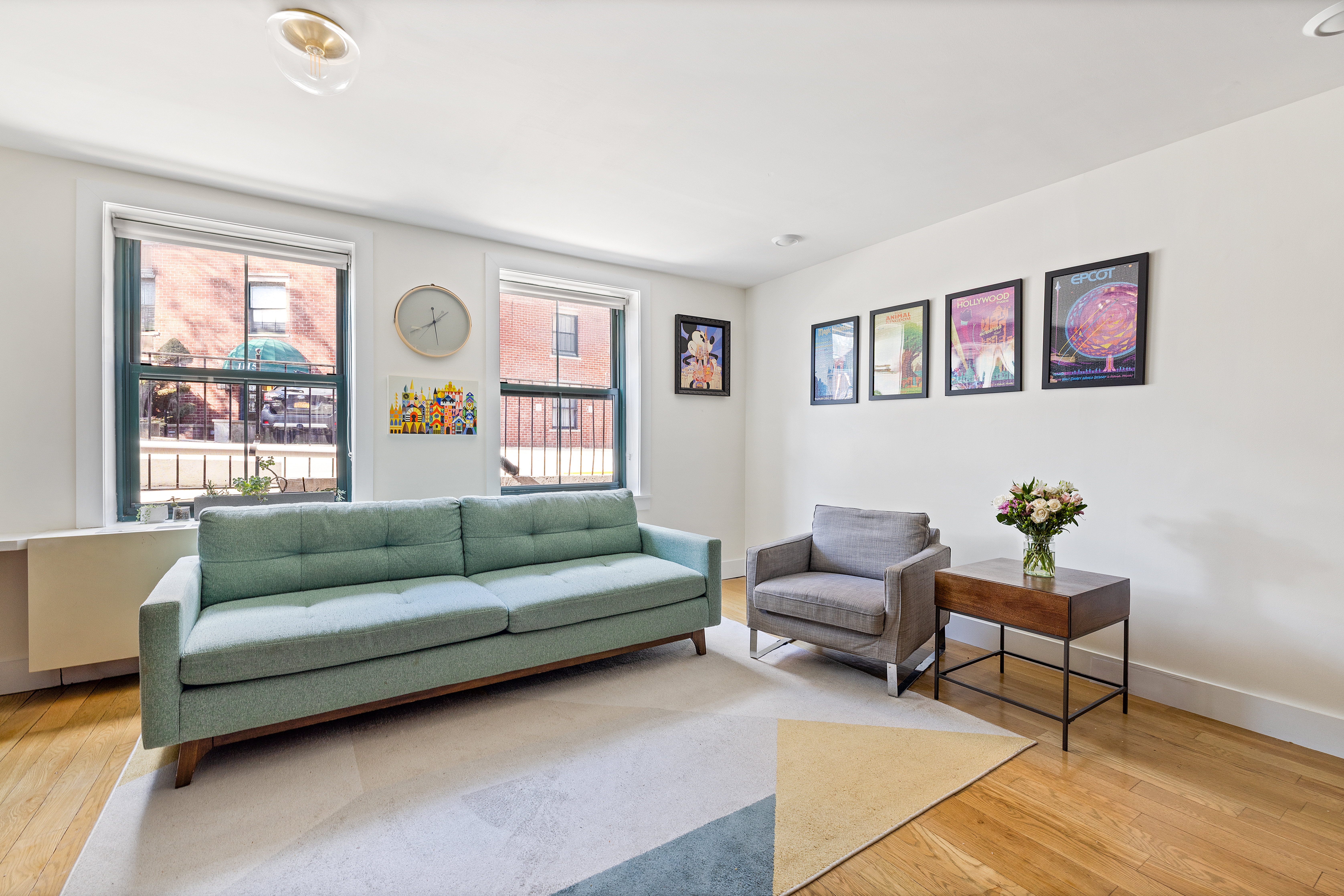 1115-1139 Prospect Avenue, Unit 1B Brooklyn, NY 11218 - Photo 2 of 9 a living room with furniture and a window