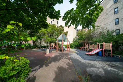 a front view of a house with large windows