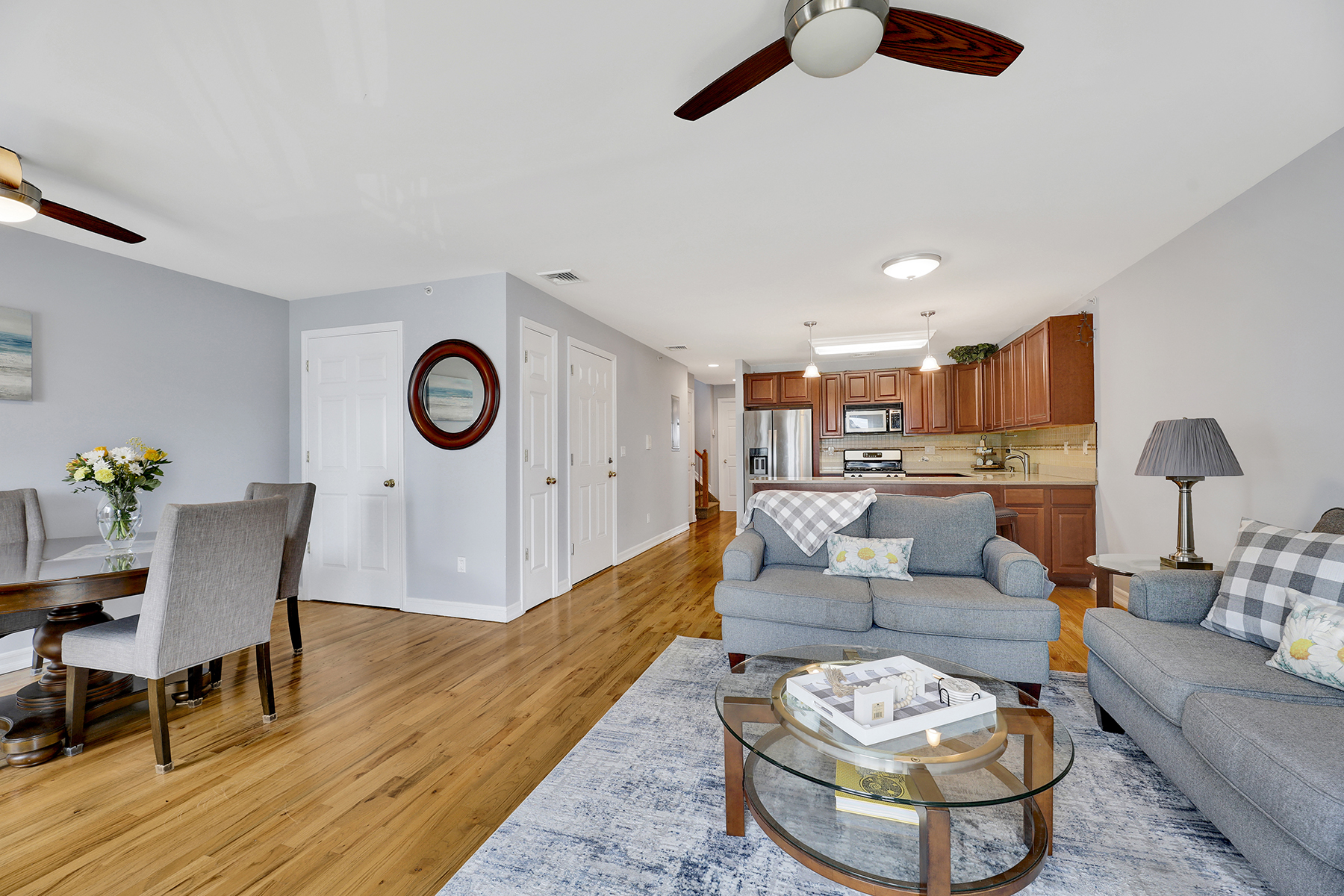 10220 Rockaway Beach Boulevard, Unit 3C Queens, NY 11694 - Photo 3 of 46 a living room with furniture and a table