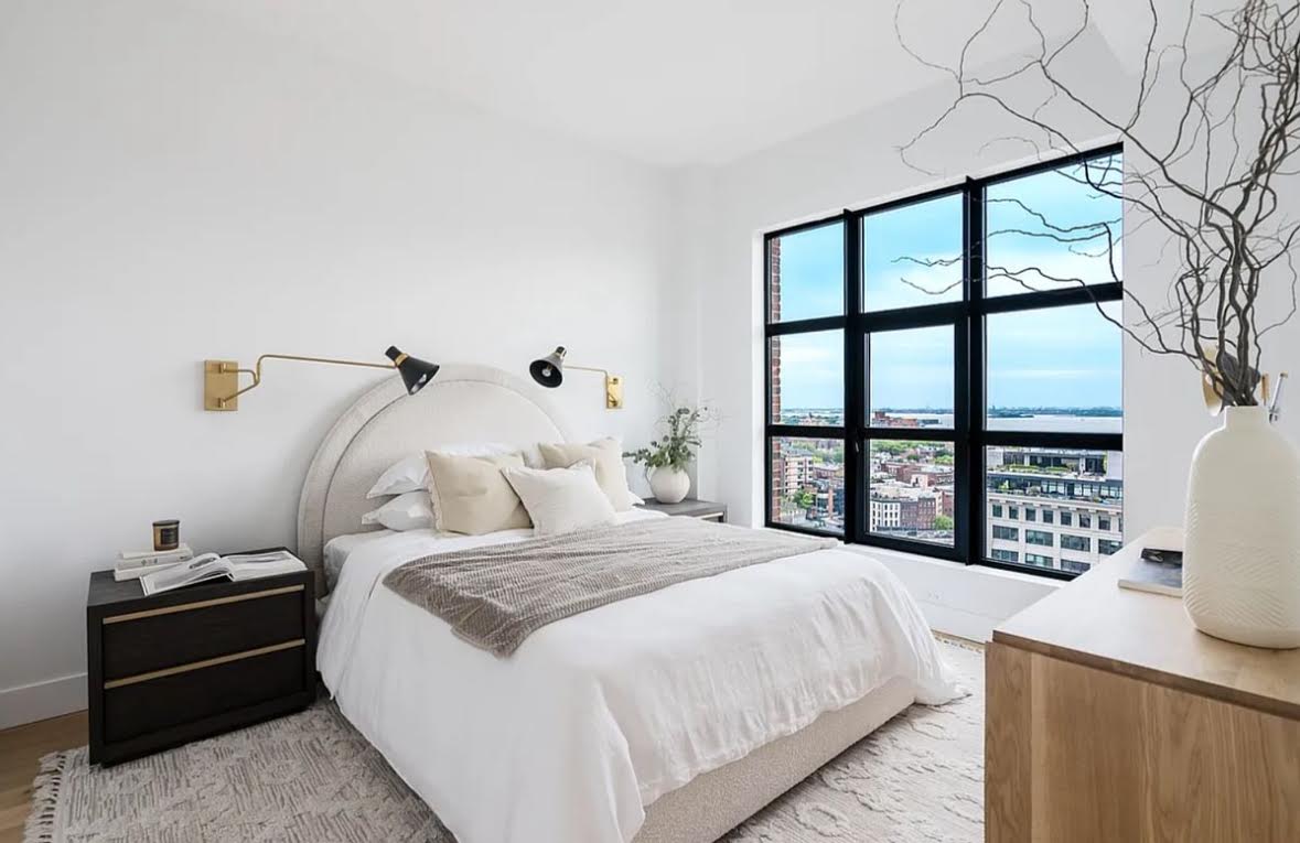 69 Adams Street, Unit 20A Brooklyn, NY 11201 - Photo 5 of 14 a bedroom with a bed and a large window
