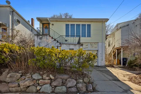 a front view of house with yard