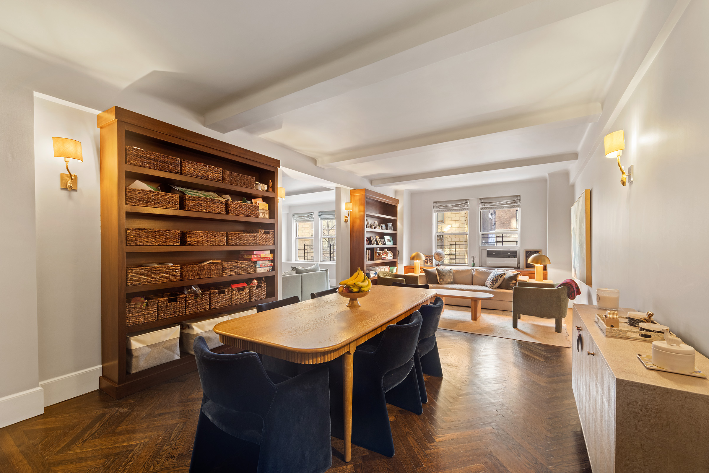 25 East 86th Street, Unit 3C Manhattan, NY 10028 - Photo 3 of 15 a view of a dining room with furniture and wooden floor