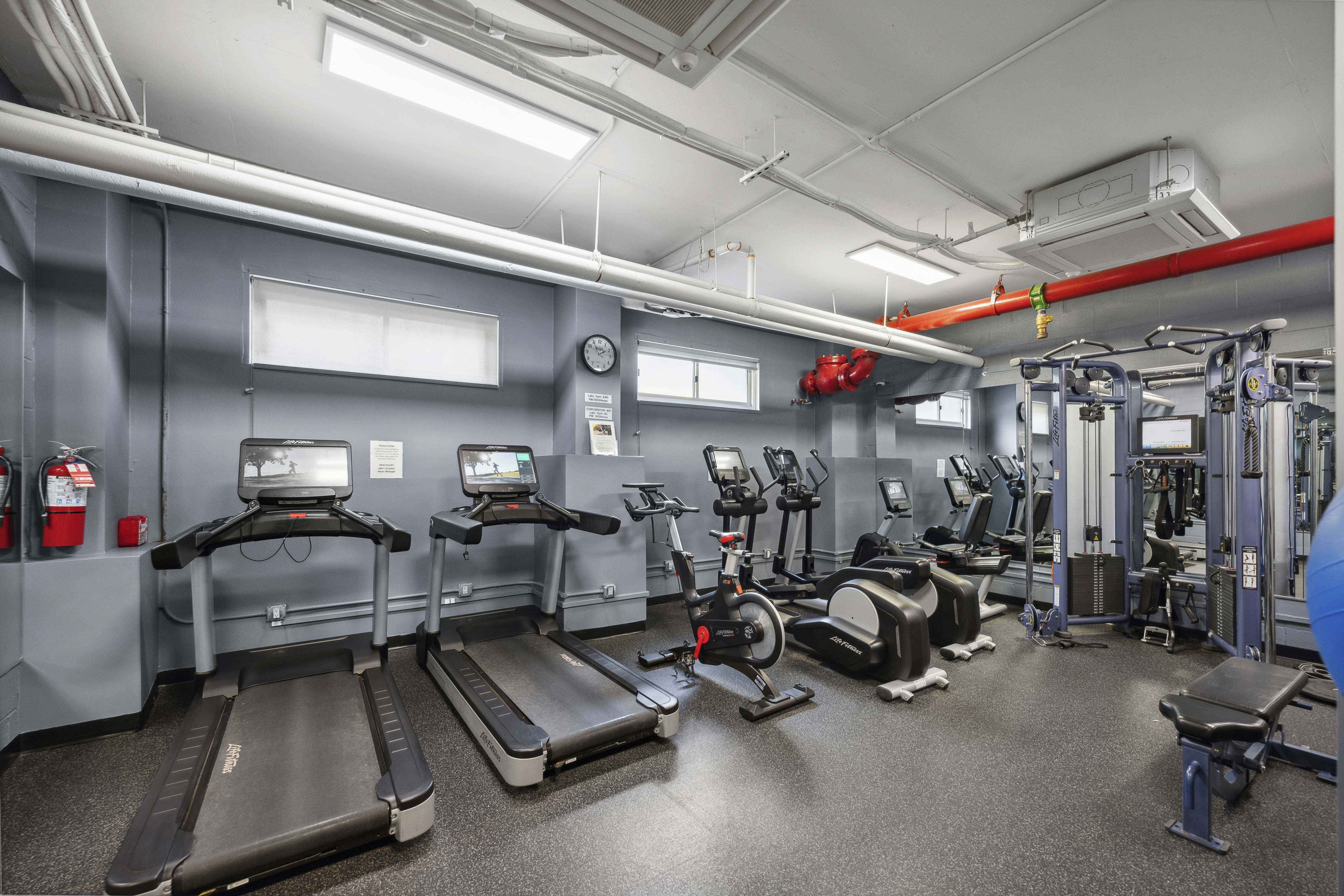 303 West 66th Street, Unit 2AE Manhattan, NY 10023 - Photo 11 of 15 a view of a room with gym equipment