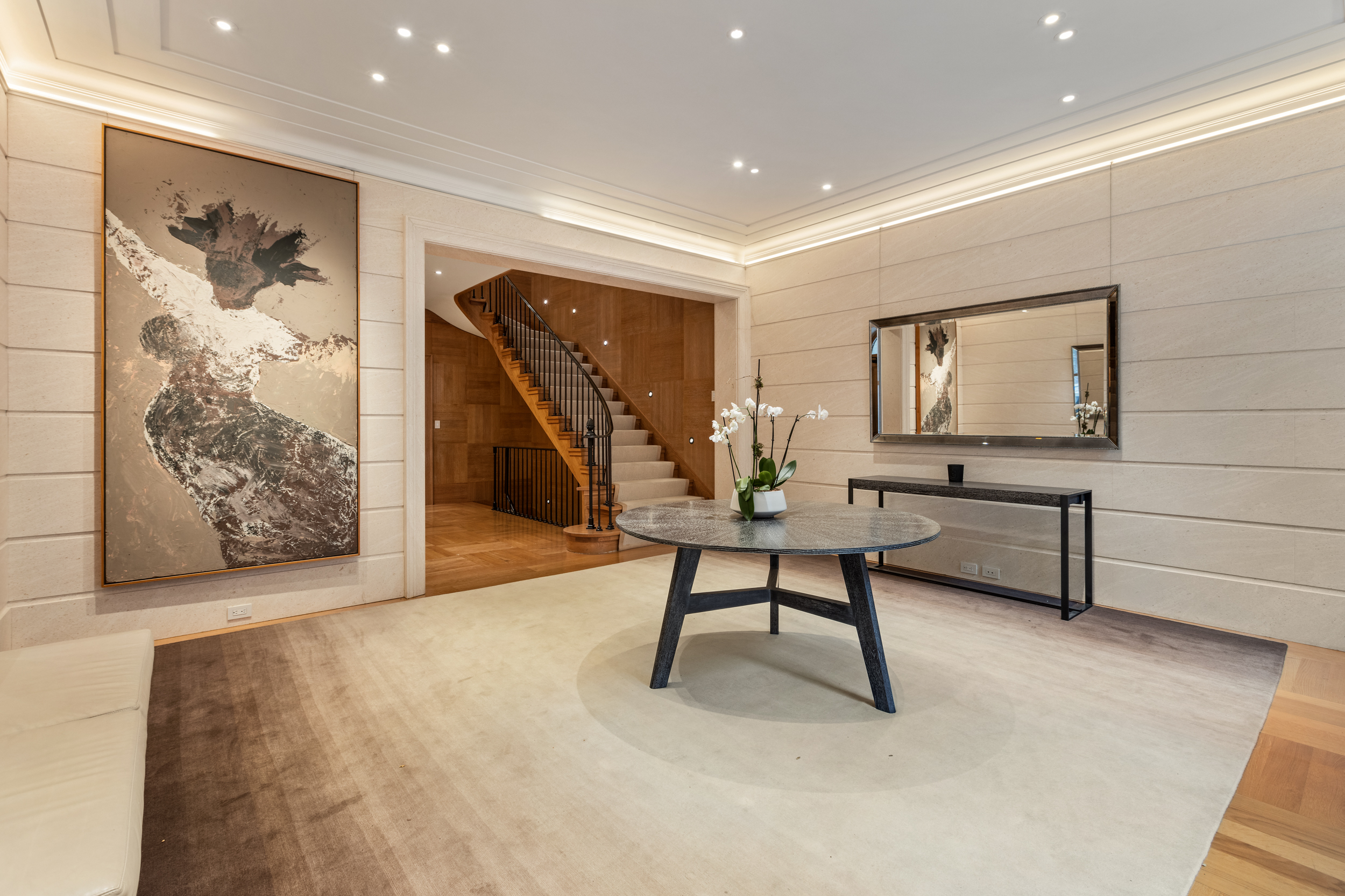 45 East 74th Street Manhattan, NY 10021 - Photo 4 of 33 a living room with furniture and a potted plant