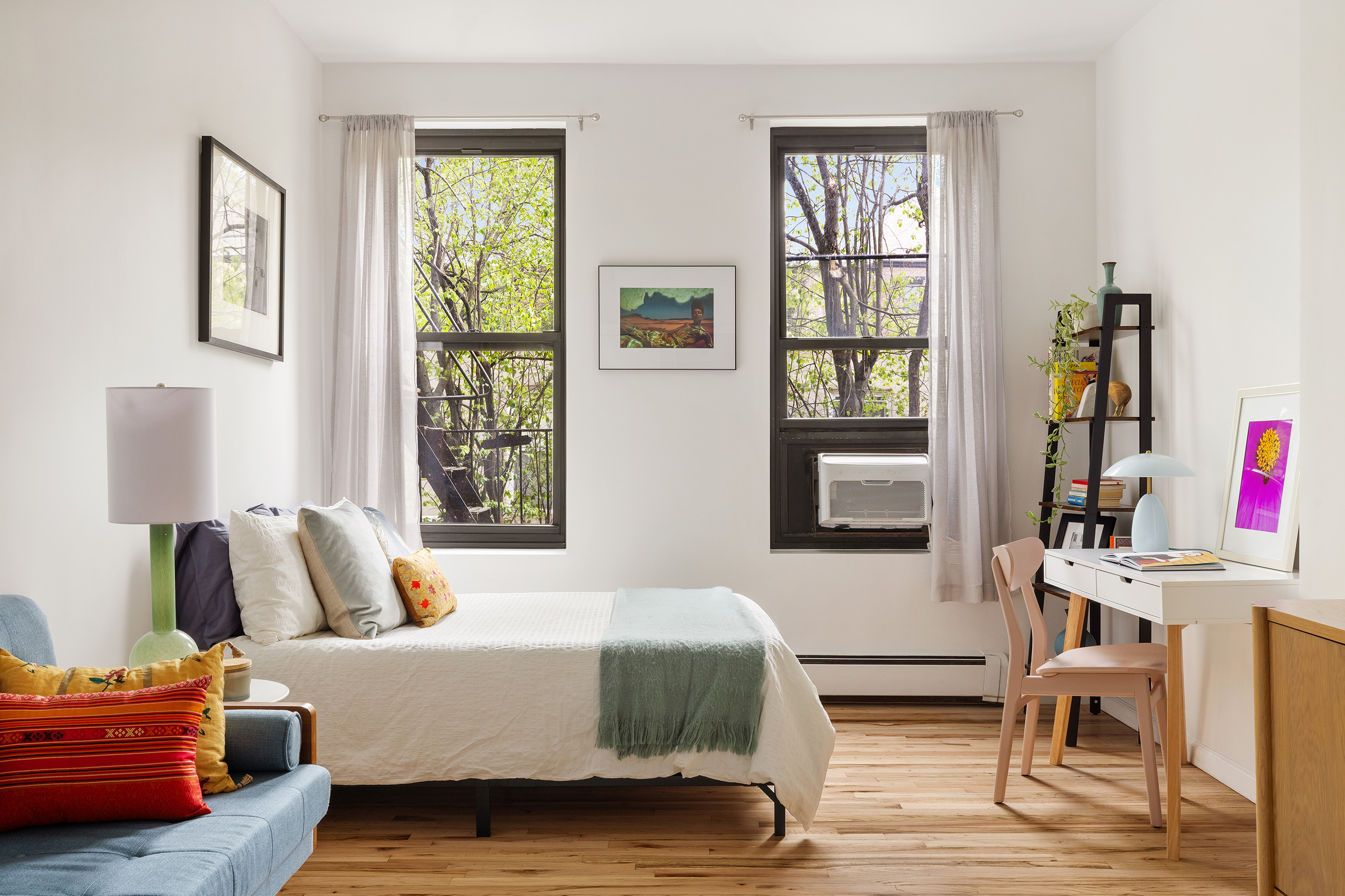 195 Garfield Place, Unit 2G Brooklyn, NY 11215 - Photo 2 of 11 a bedroom with a bed wooden floor and window